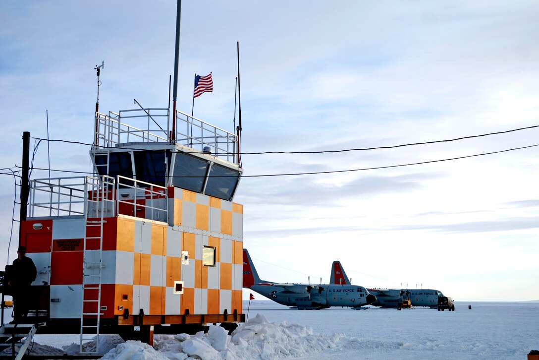 LC-130 Hercules sit in front of a control tower on the annual sea ice runway near McMurdo Station, Antarctica Nov. 27, 2007 during Operation Deep Freeze. Ski-equipped LC-130s, crews and support personnel from the New York Air National GuardÕs 109th Airlift Wing are supporting the 13th Air Force-led Joint Task Force Support Forces Antarctica, Operation Deep Freeze. Operation Deep Freeze is a unique joint and total force mission that has supported the National Science Foundation and U.S. Antarctic Program that began in 1955.

