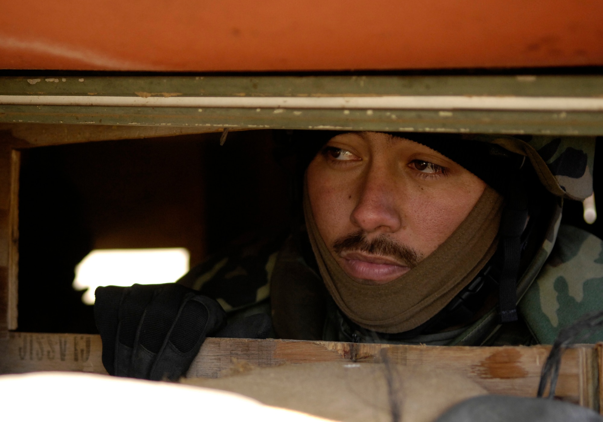 VANDENBERG AIR FORCE BASE, Calif. -- Staff Sgt. Dan Merrill, 30th Logistics Readiness Squadron, looks out of his defensive checkpoint during North Star on Dec. 13.  Vandenberg Airmen participated in this three-day exercise to practice expeditionary techniques. (U.S. Air Force photo/Airman 1st Class Jonathan Olds)
