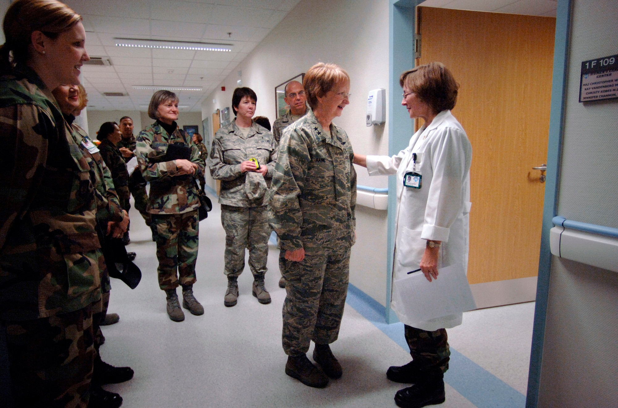 While visiting staff and patients at Landstuhl Regional Medical Center, Germany, Dec. 12  Maj. Gen. Melissa A. Rank, Assistant Air Force Surgeon General, Medical Force Development and Nursing Services, is greeted in the Women's Care Center by Maj. Leslie Christopher, a women's health nurse practitioner. (U.S. Air Force photo/Master Sgt. Scott Wagers)

Among many of General Rank's asigned responsibilities is to influence policy and enhancement actions for more than 34,000 active-duty officer and enlisted medical personnel and creates and evaluates nursing policies and programs for 19,000 active-duty, Guard and Reserve nursing personnel. 

General Rank is assigned to the Office of the Surgeon General at Bolling Air Force Base, D.C.
Photo by Master Sgt. Scott Wagers / (released)
