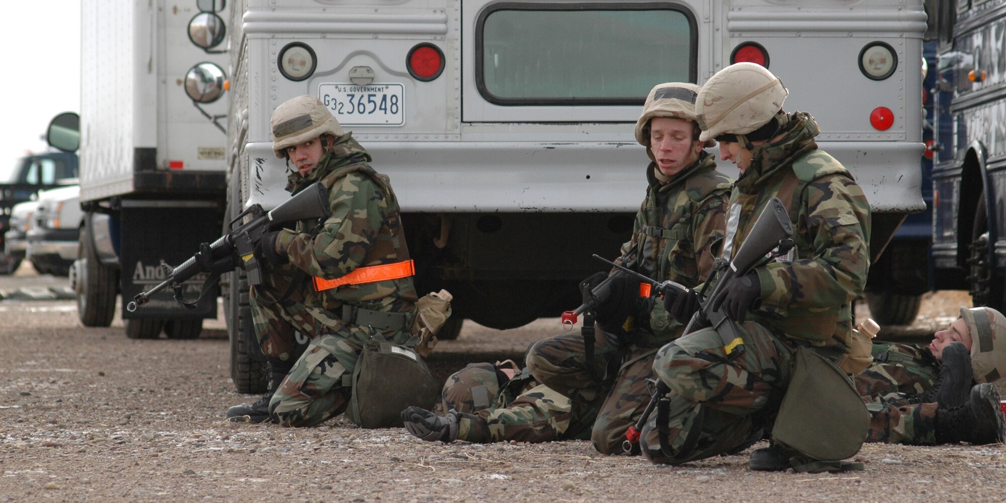 Airmen protect injured warriors during an expeditionary readiness exercise at Camp Grizzly Dec. 12. (U.S. Air Force photo/Airman 1st Class Dillon White)