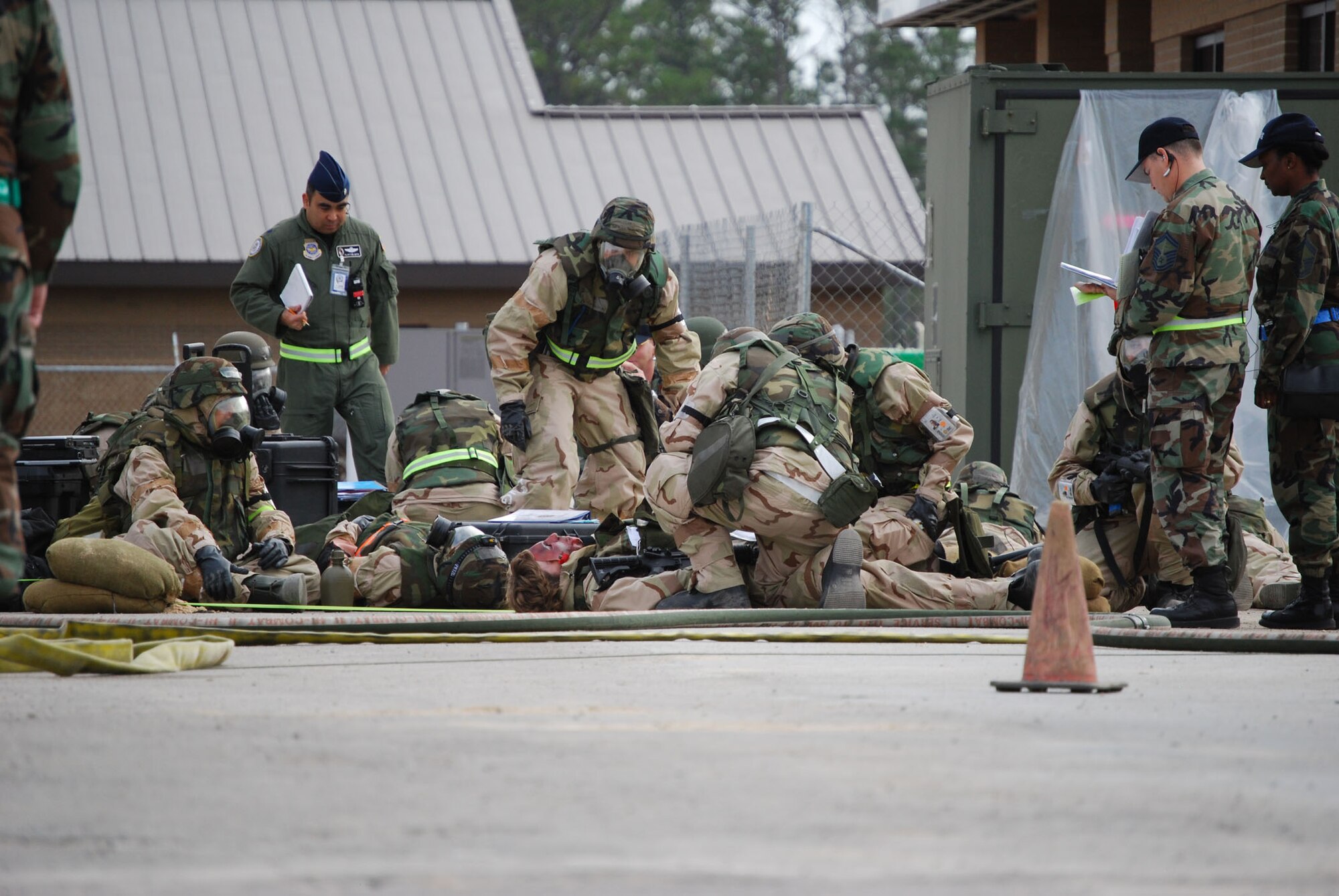 During the recent Operational Readiness Inspection, headquarters elements were evacuated to a bunker during a simulated attack. Reserve Airmen in the bunker tend to simulated injuries, testing their first responder skills. Reserve units and Airmen must meet the same stringent standards as their active-duty counterparts. (U.S. Air Force Photo/Master Sgt. Collen McGee) 