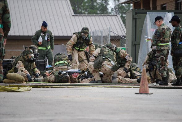 During the recent Operational Readiness Inspection, headquarters elements were evacuated to a bunker during a simulated attack. Reserve Airmen in the bunker tend to simulated injuries, testing their first responder skills. Reserve units and Airmen must meet the same stringent standards as their active-duty counterparts. (U.S. Air Force Photo/Master Sgt. Collen McGee) 