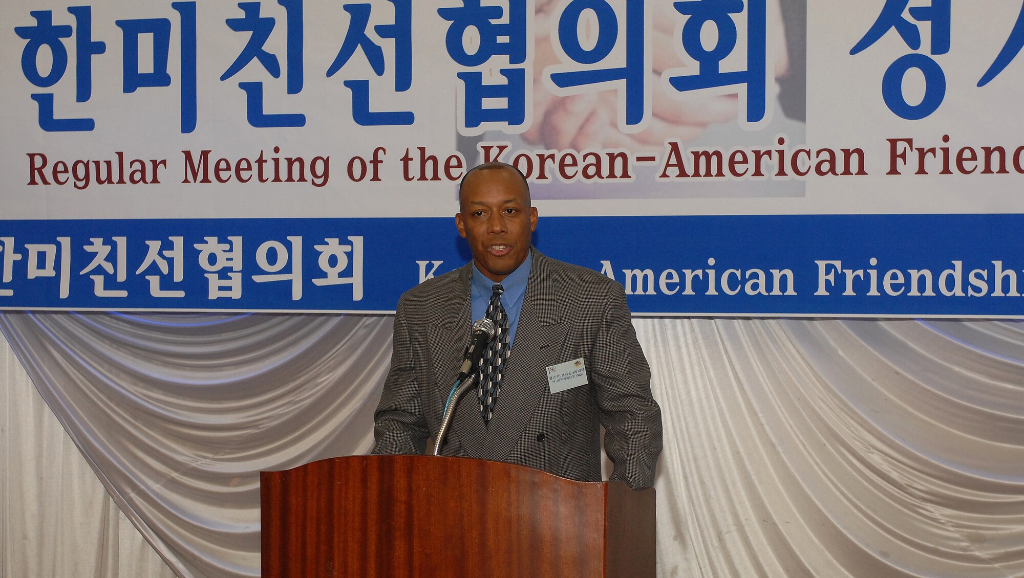 GUNSAN CITY, South Korea -- Colonel CQ "Wolf" Brown, 8th Fighter Wing
Commander addresses attendees during the Annual Friendship Dinner opening ceremony here Dec. 20. The dinner is part of the Good Neighbor Program that highlights the relationship between the Republic of Korea and United States military. (U.S. Air Force photo/Senior Airman Giang Nguyen)
