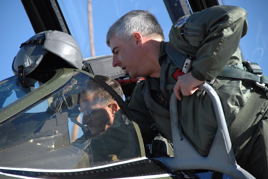 Maj. John Markle, Detachment 1, 82nd Aerial Targets Squadron duty officer, familiarizes Brig. Gen. David Goldfein, 49th Fighter Wing commander, on F-4 Phantom controls Dec. 20, 2007, at Holloman Air Force Base, N.M. Major Markle was the instructor pilot for General Goldien's flight in the Phanton. (U.S. Air Force photo/Airman 1st Class Jamal D. Sutter)
