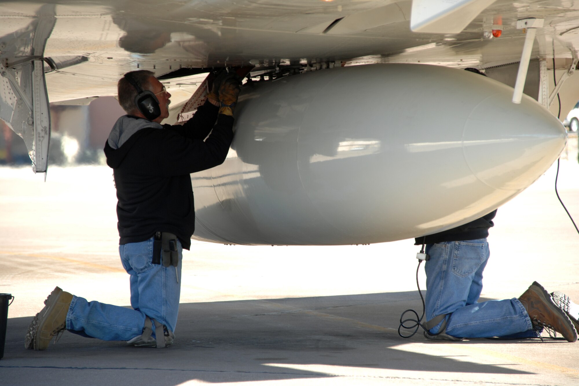 Art Fisher, Lockheed Martin Services Incorporated maintainer, secures the panel for flight Dec. 20, 2007, at Holloman Air Force Base, N.M. Fisher was one of the maintainers for Brig. Gen. David Goldfein's first flight in the F-4 Phantom. (U.S. Air Force photo/Airman 1st Class Jamal D. Sutter)