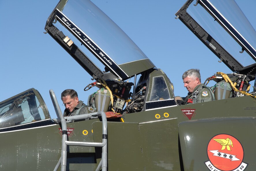 Brig. Gen. David Goldfein, 49th Fighter Wing commander, and Maj. John Markle, Detachment 1, 82nd Aerial Targets Squadron duty officer, prepares to exit the aircraft after a successful flight in the F-4 Phantom Dec. 20, 2007, at Holloman Air Force Base, N.M. This was General Goldfein's first time flying the Phantom and Major Markle served as his instructor pilot. (U.S. Air Force photo/Airman 1st Class Jamal D. Sutter)