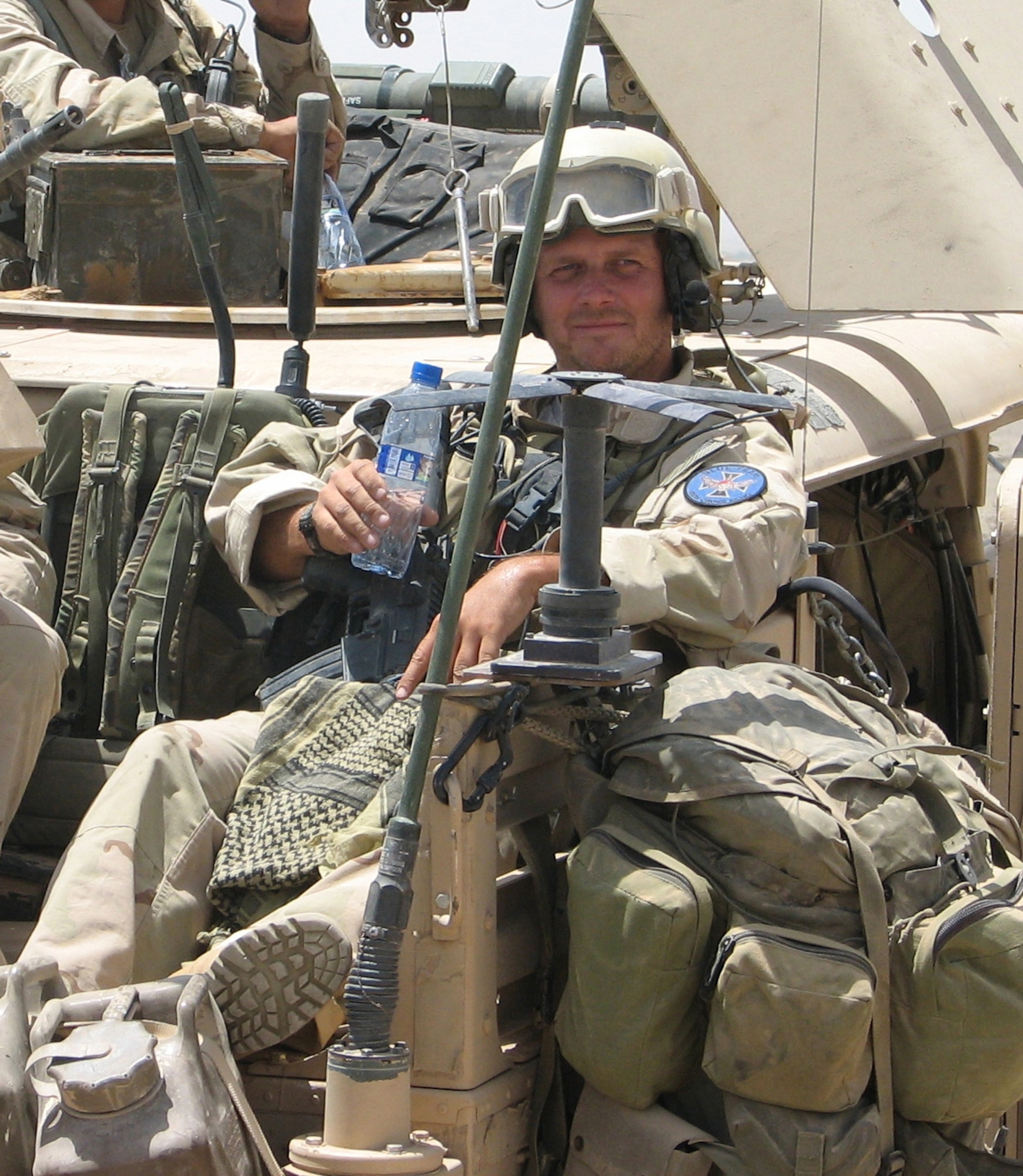 Tech. Sgt. Scott Innis, a combat controller with the 22nd Special Tactics Squadron, is pictured during his 2006 deployment to Afghanistan. During this deployment, Sergeant Innis served as a joint terminal air controller attached to an Army Special Forces team. One day, his team's forward operating base came under heavy enemy fire. Sergeant Innis risked his life by climbing up a small, wooden observation tower in the middle of the base in order to direct close air support against the enemy. Despite making himself a magnet for bullets and rocket propelled grenades, the combat controller stayed in the tower for 24 hours directing fire, resulting in the elimination of more than 100 enemy fighters. Sergeant Innis was presented a Silver Star Dec. 18 for his actions that day in Afghanistan. (Courtesy photo)