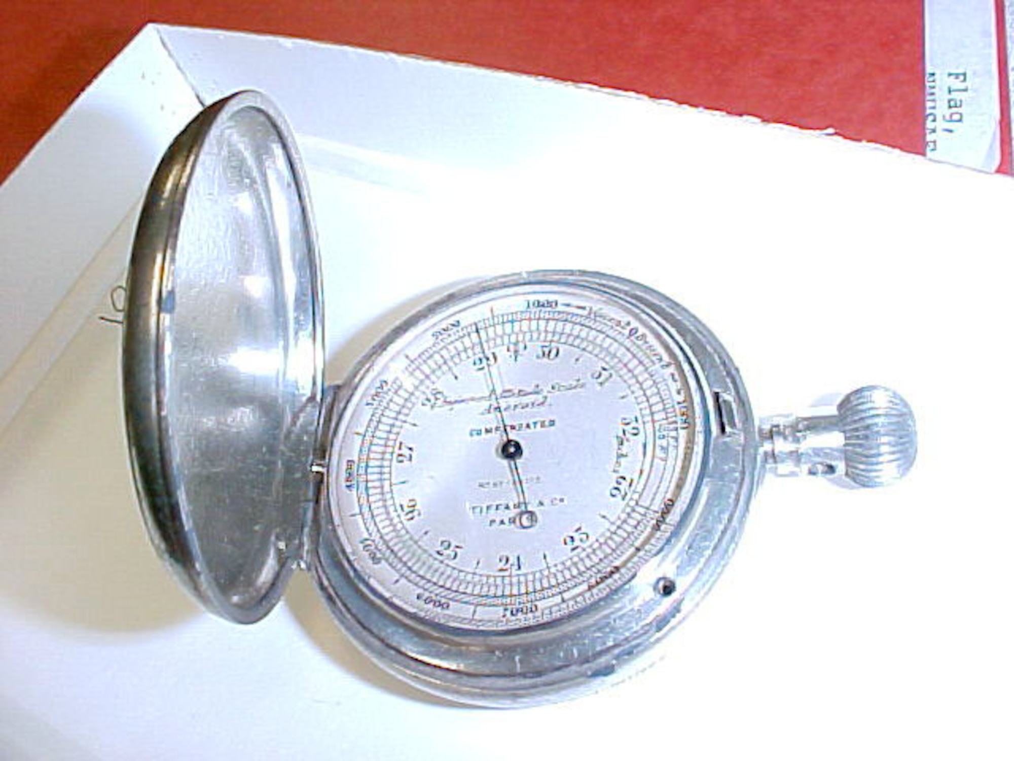This altimeter indicator belonged to the donor's uncle, William Thaw, who flew with the Lafayette Escadrille. The item reads "Improved Altitude Scale Aneroid, Compensated." (U.S. Air Force photo)