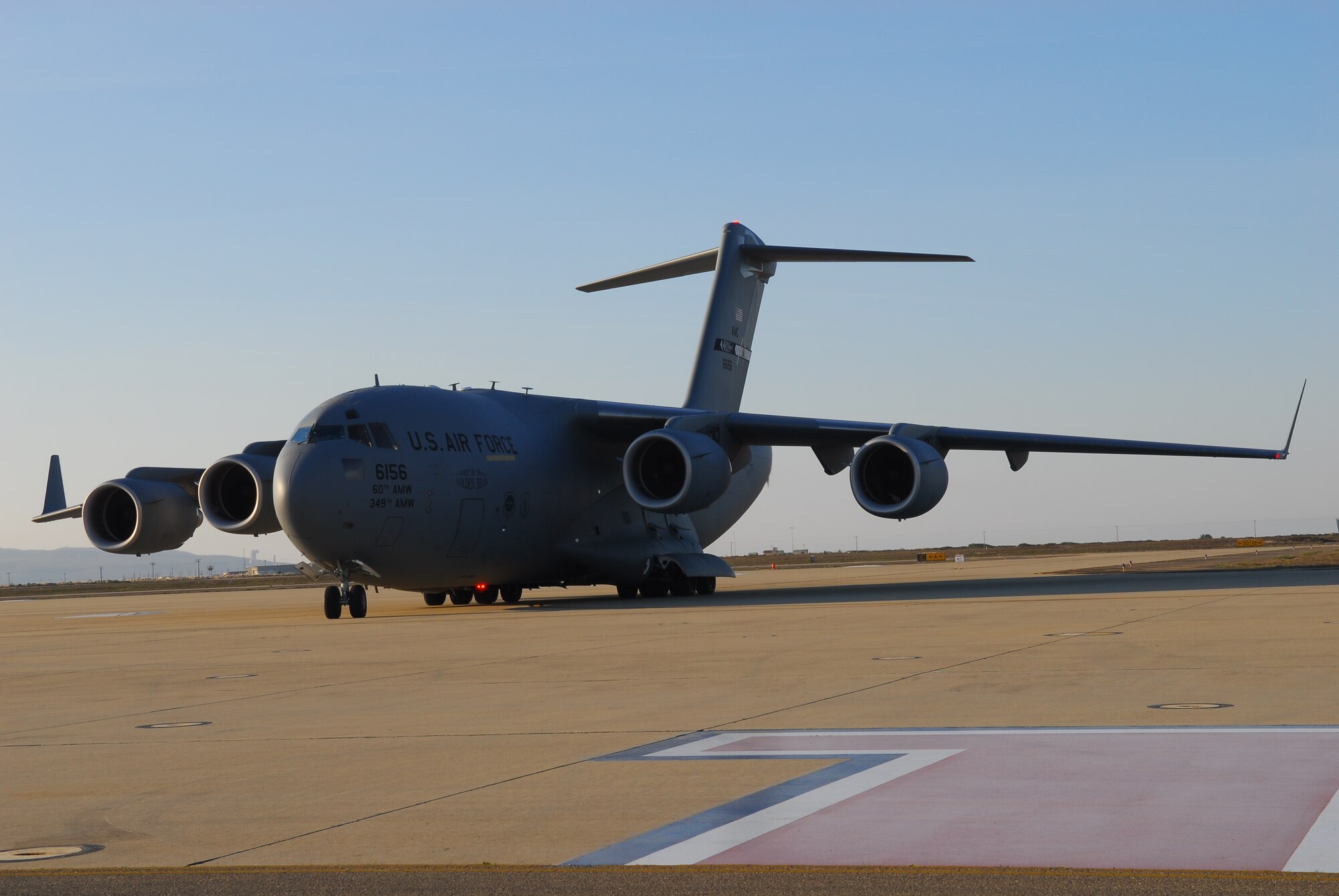 VANDENBERG AIR FORCE BASE, Calif. -- A C-17 aircraft is taxiing in before stopping to drop off the Defense Meteorological Satellites Program, (DMSP), satellite, here on Dec. 14. The DMSP satellite monitors solar-terrestrial physics and provides photographic reconnaissance and surveillance for the U.S. Department of Defense. It's a valuable tool in scheduling and protecting military operations in the Air Force.
(U.S. Air Force photo/Airman 1st Class Ashley Tyler)