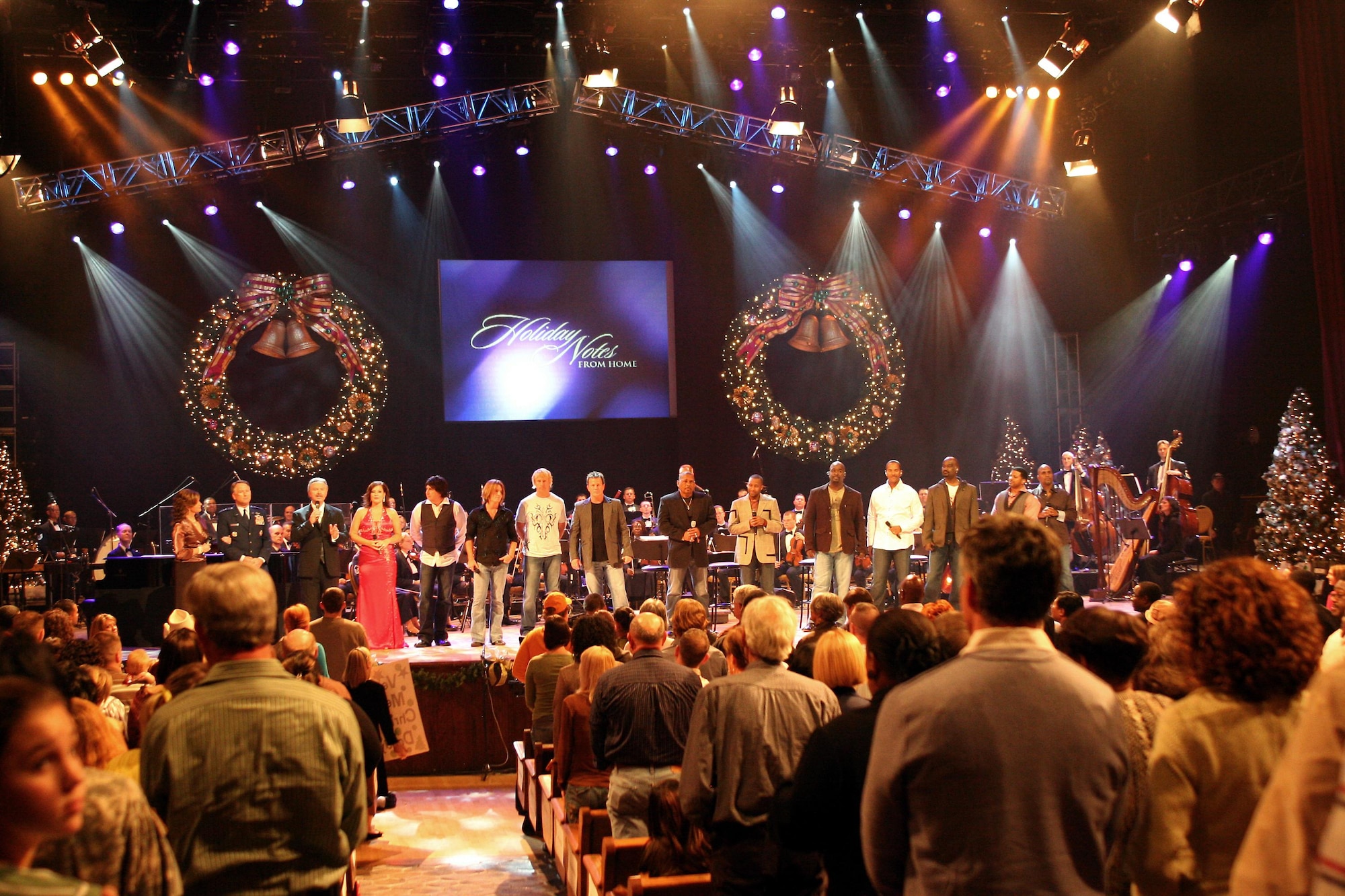 Lt. Gen. John A. Bradley, chief of the Air Force Reserve, with all of the performers of this year's Holiday Notes from Home production at the Grand Ole Opry in Nashville, Tenn.  Holiday Notes from Home is an annual concert recorded for broadcasting to audiences around the world during December. The band of the Air Force Reserve and the Air Force Strings performed in the show. (U.S. Air Force photo).