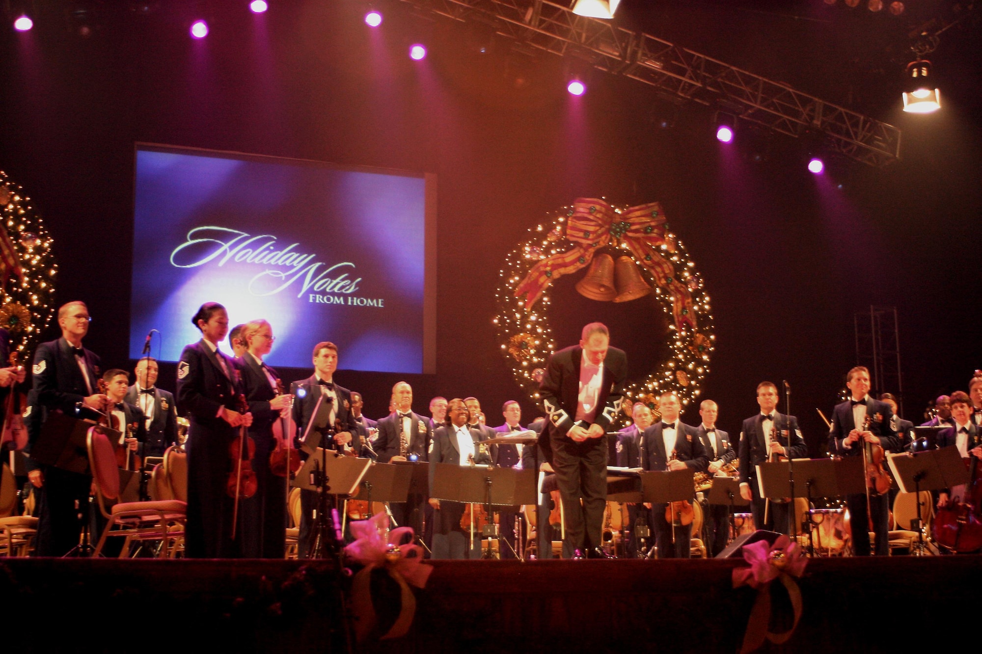 The Band of the Air Force Reserve from Robins Air Force Base, Ga., and Air Force Strings from Washington, D.C., perform in this year's Holiday Notes from Home production at the Grand Ole Opry in Nashville, Tenn.  Holiday Notes from Home is a annual concert recorded for broadcasting to audiences around the world during December. (U.S. Air Force photo)