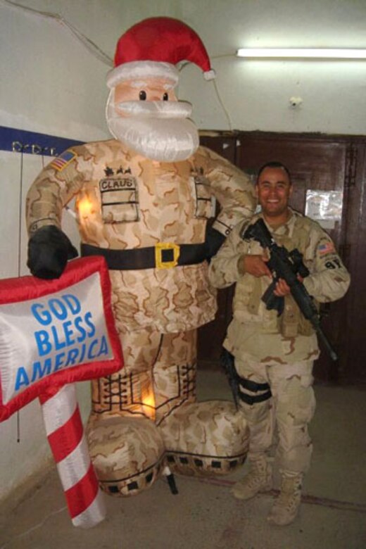 Staff Sgt. John Holliday, a Reserist with the 433rd Security Forces Squadron, has holiday spirit at his deployed location in Iraq. Sergeant Holliday is one of about 40 members of the Alamo Wing's SFS squadron serving four months of active-duty in support of the Global War on Terror. (U.S. Air Force Courtesy Photo)