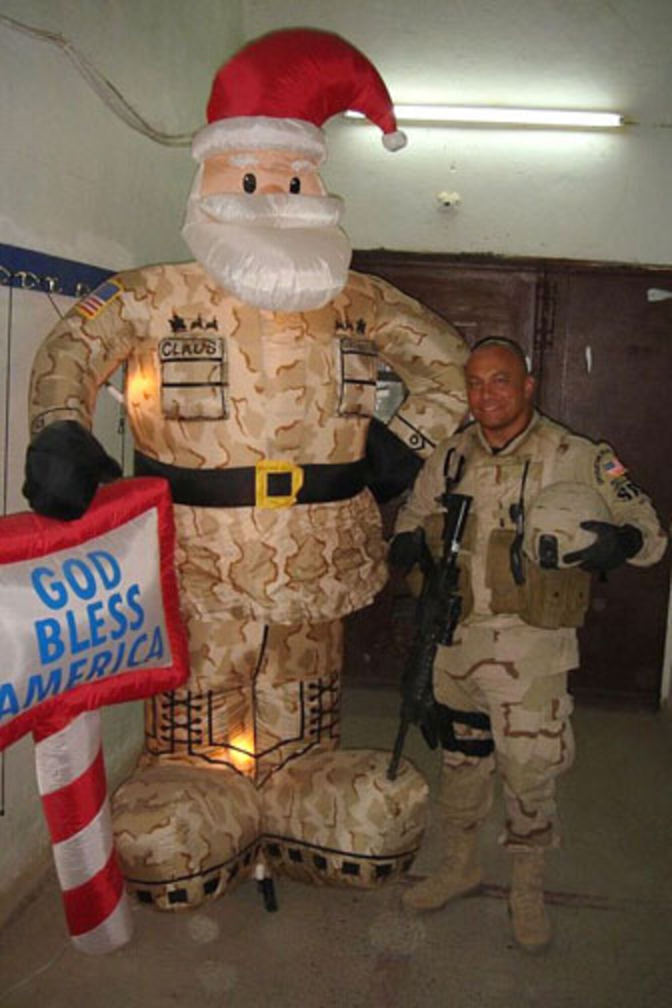 Tech. Sgt. Jesus "DG" Deleon-Guerrero, a Reserist with the 433rd Security Forces Squadron, has holiday spirit at his deployed location in Iraq. Sergeant Deleon-Guerrero is one of about 40 members of the Alamo Wing's SFS squadron serving on four months of active-duty in support of the Global War on Terror. (U.S. Air Force Courtesy Photo)