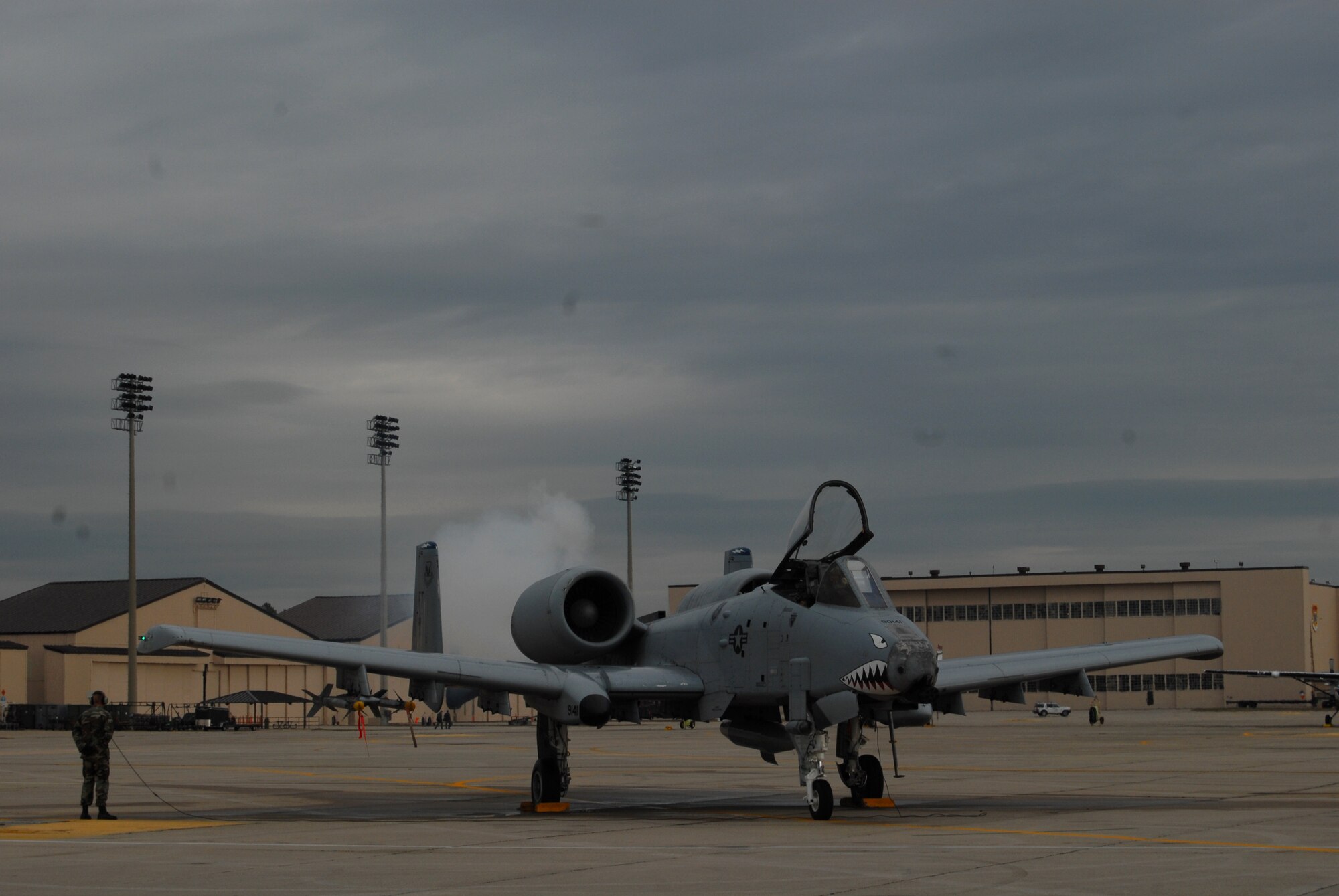 Airmen prepare the last A-10 Thunderbolt II for take off Wednesday. Pope's last three A-10 aircraft left for Moody Air Force Base, Ga. (U.S. Air Force photo/Staff Sgt. Cassandra Locke)