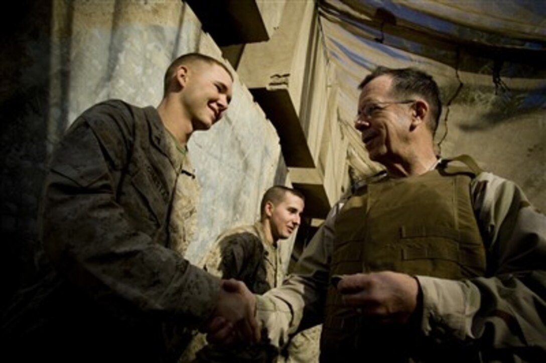 Chairman of the Joint Chiefs of Staff Navy Adm. Mike Mullen greets Marines in Ramadi, Iraq, on Dec. 19, 2007.  Mullen is in theater to meet with senior leaders and deployed troops.  