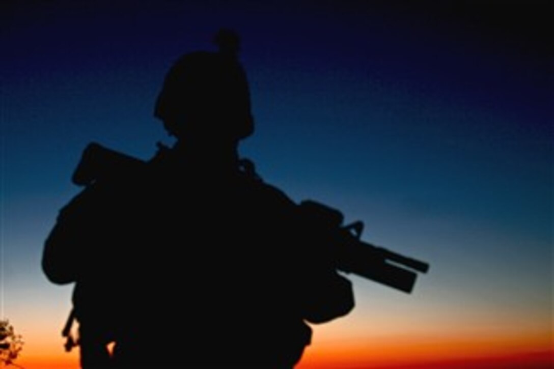 A “no slack” soldier from the 2nd Battalion, 327th Infantry Regiment, 1st Brigade Combat Team, 101st Airborne Division takes up an over-watch position in Samarra, Iraq, Dec. 10, 2007. The “no slack” battalion is responsible for the security of the restive city. 