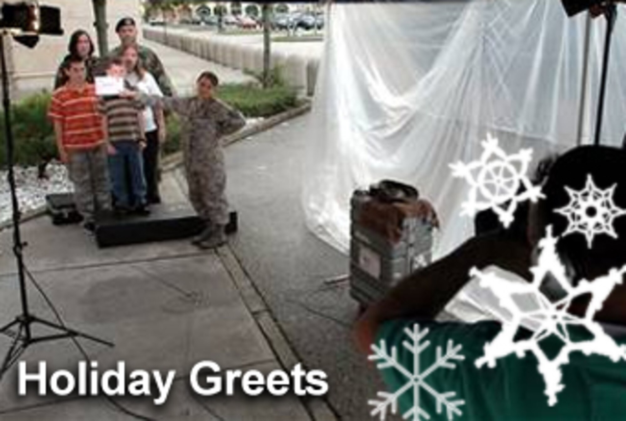 The holiday greetings program provides servicemembers away from home the chance to send a holiday message to those they can't be with this time of year. Traditionally seen on TV, many greetings now can be seen online.  (U.S. Air Force illustration/Luke Borland)
