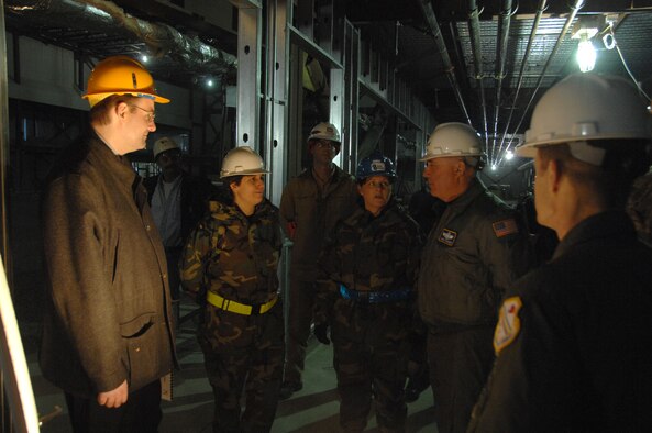 EIELSON AIR FORCE BASE, Alaska -- Maj. Catherine McGowan, 354th Force Support Squadron commander, explains to Gen. Carrol Chandler, Pacific Air Forces commander, on the progress of the indoor track and field that is expected to be finished next year, while touring the fitness center Dec. 18. (U.S. Air Force photo by Airman 1st Class Christopher Griffin)