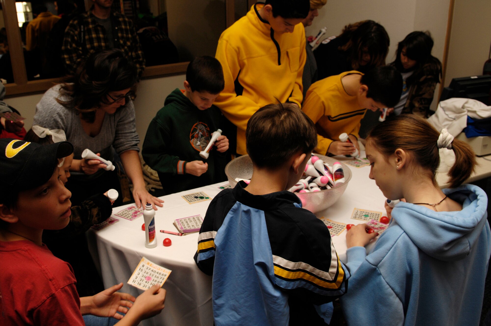 VANDENBERG AIR FORCE BASE, Calif. -- Children play a game of bingo during Breakfast with Santa at the Pacific Coast Club on Dec. 15. Over 500 children attended the annual event hosted by the 30th Services Division. The event was free to the entire base and included a photo opportunity with Santa, breakfast, holiday arts and crafts, games, and prize give-a-ways.  (U.S. Air Force photo/Airman 1st Class Christian Thomas)
