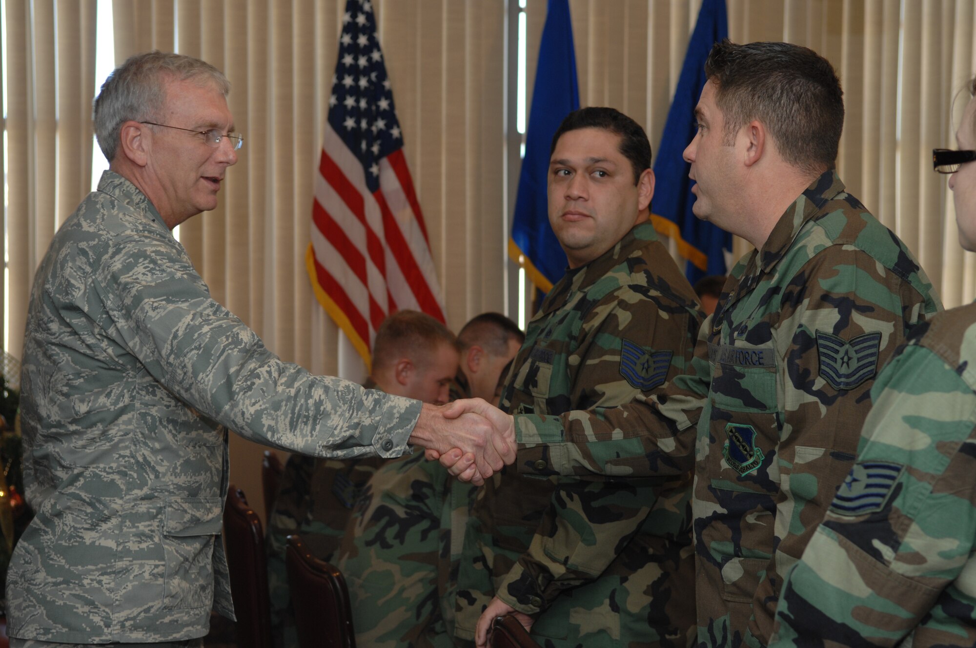 DYESS AFB, Texas -- Major Gen. P.David Gillett Jr., Director of Logistics, Headquarters Air Combat Command, greets members of the 5/6 club during his visit here Dec. 18-19. During his visit he toured facilities and spoke to Airmen future Air Force issues. (Air Force photo by Airman 1st Class Jennifer Romig)