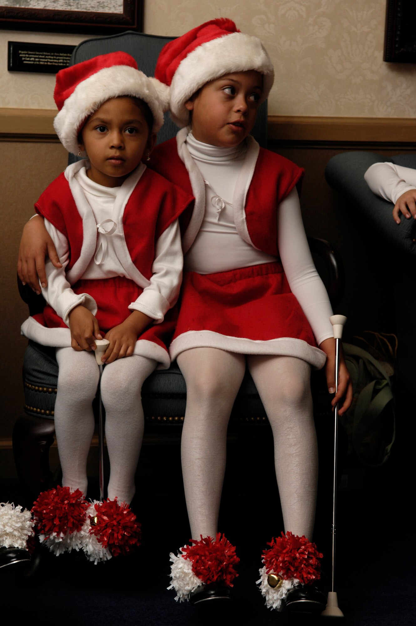 VANDENBERG AIR FORCE BASE, Calif. -- Members of the Vandenberg Youth Programs Baton Twirlers rest after performing an act during Breakfast with Santa at the Pacific Coast Club on Dec. 15. Over 500 children attended the annual event hosted by the 30th Services Division. The event was free to the entire base and included a photo opportunity with Santa, breakfast, holiday arts and crafts, games, and prize give-a-ways.  (U.S. Air Force photo/Airman 1st Class Christian Thomas)