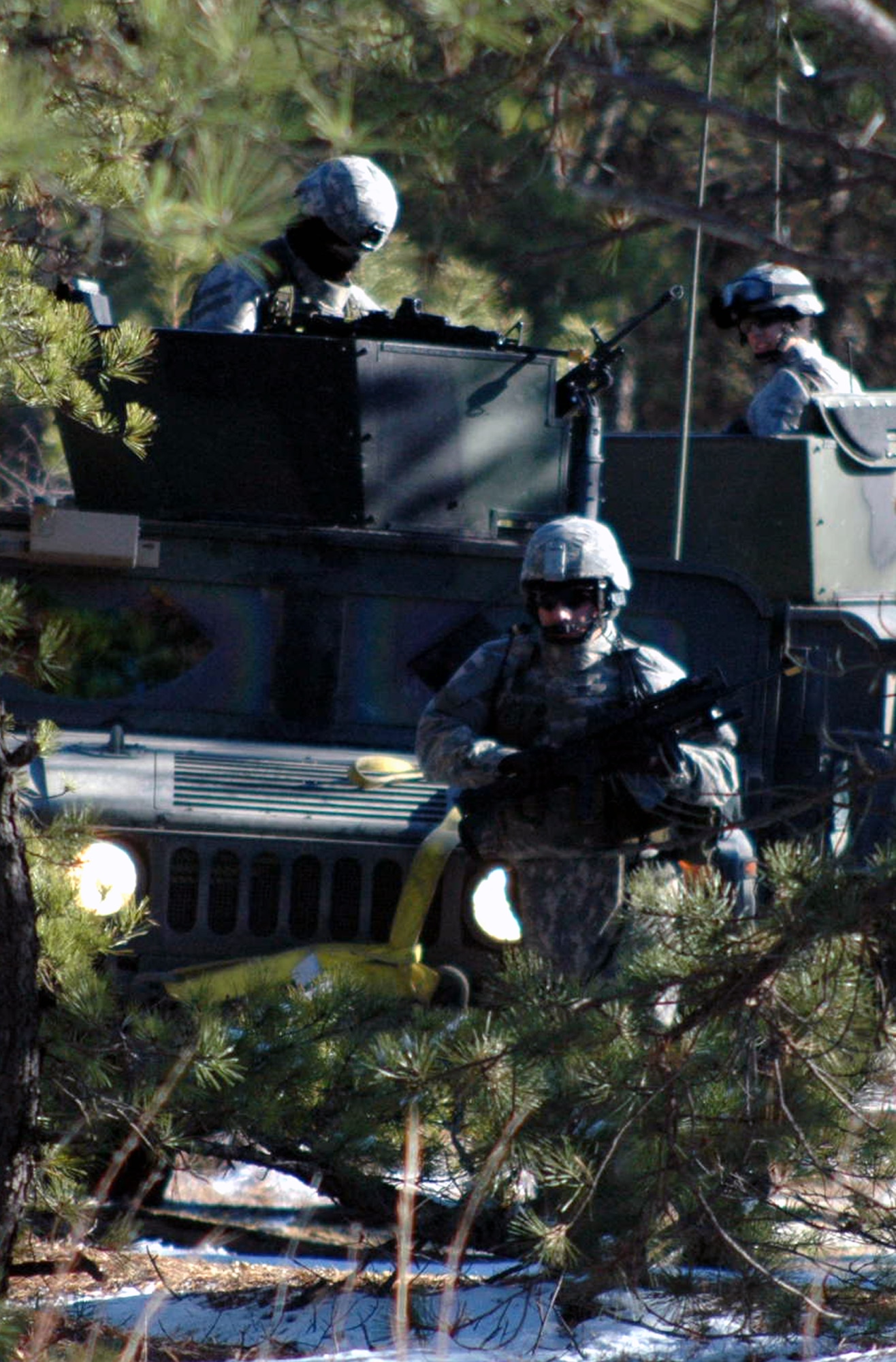 Security forces students in the Tactical Security Element Training Course 08-A prepare for a mounted patrol (convoy) scenario during training on a range on Fort Dix, N.J., Dec. 6.  The course is the first of its kind by the U.S. Air Force Expeditionary Center, also from Fort Dix.  Taught with instructors from the Air Force Office of Special Investigations and security forces cadre from the Center's 421st Combat Training Squadron, the training is designed to prepare security forces for "outside the wire" missions with OSI in the deployed environment.  (U.S. Air Force Photo/Tech. Sgt. Scott T. Sturkol)