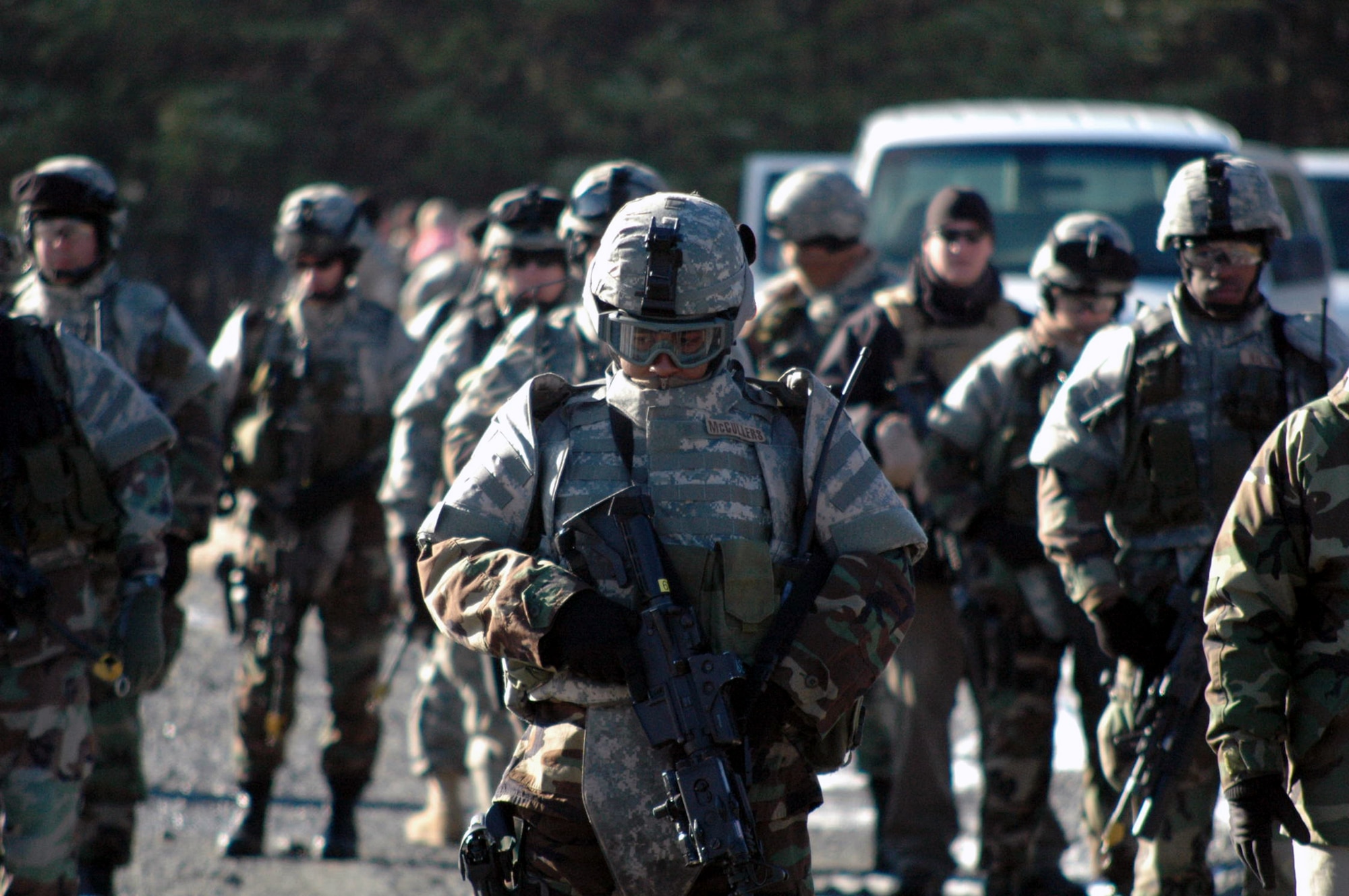 Security forces students in the Tactical Security Element Training Course 08-A practice a dismounted patrol scenario during training on a range on Fort Dix, N.J., Dec. 6.  The course was the first of its kind by the U.S. Air Force Expeditionary Center, also from Fort Dix.  Taught with instructors from the Air Force Office of Special Investigations and security forces cadre from the Center's 421st Combat Training Squadron, the training is designed to prepare security forces for "outside the wire" missions with OSI in the deployed environment.  (U.S. Air Force Photo/Tech. Sgt. Scott T. Sturkol)