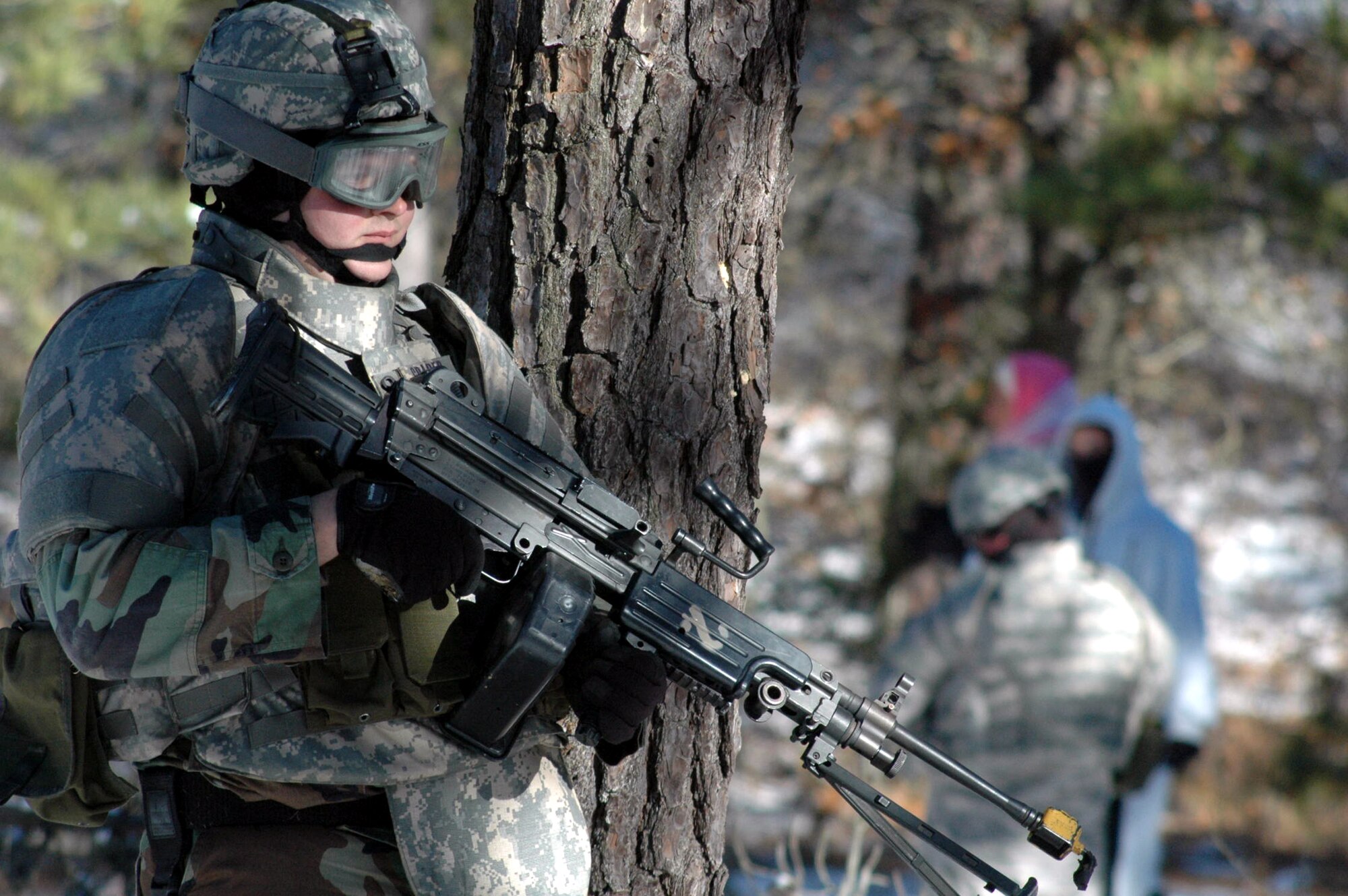 Security forces students in the Tactical Security Element Training Course 08-A practice a dismounted patrol scenario during training on a range on Fort Dix, N.J., Dec. 6.  The course was the first of its kind by the U.S. Air Force Expeditionary Center, also from Fort Dix.  Taught with instructors from the Air Force Office of Special Investigations and security forces cadre from the Center's 421st Combat Training Squadron, the training is designed to prepare security forces for "outside the wire" missions with OSI in the deployed environment.  (U.S. Air Force Photo/Tech. Sgt. Scott T. Sturkol)