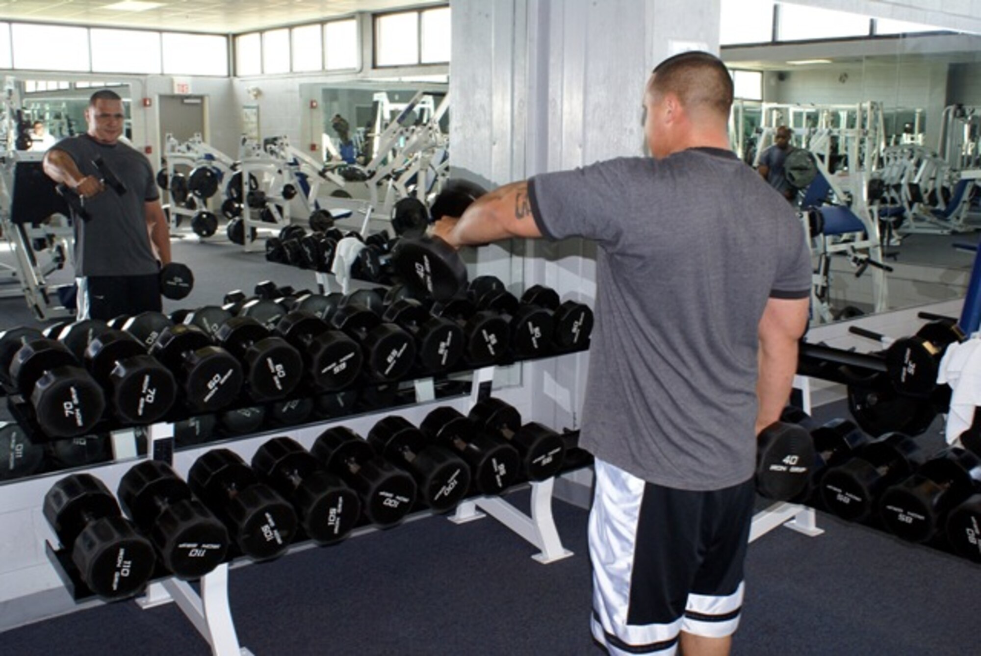 Mr. Carlos Eyzaguirre, former 482nd Security Forces Squadron member, works out at the Homestead Sports and Fitness Center. The facility and its staff received the most prestigious distinction for a fitness center in the Air Force, a five-star rating for their services by the Air Force Services Agency. Homestead’s facility is one of 29 fitness centers in the Air Force to reach the enviable 5-star rating for 2007, and the first ever from the Air Force Reserve to receive this merit. (U.S. Air Force photo/Senior Airman Erik Hofmeyer)