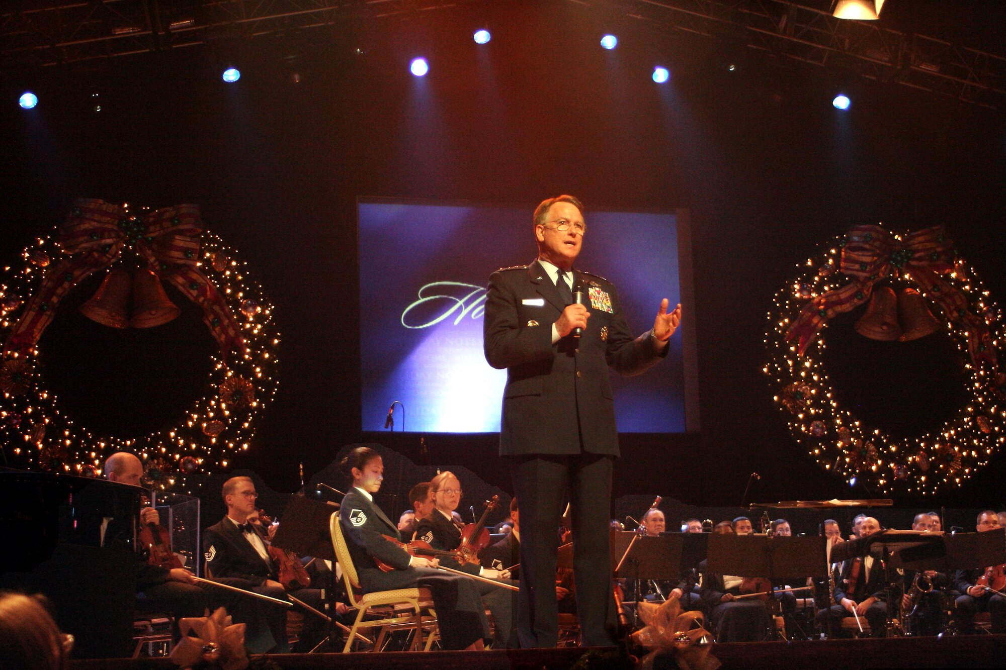 Lt. Gen. John A. Bradley, chief of the Air Force Reserve, addresses the audience at this year's Holiday Notes from Home recording session at the Grand Ole Opry in Nashville, Tenn. Holiday Notes from Home is an annual concert recorded for broadcasting to audiences around the world during December. The band of the Air Force Reserve and the Air Force Strings performed in the show. (U.S. Air Force photo) 