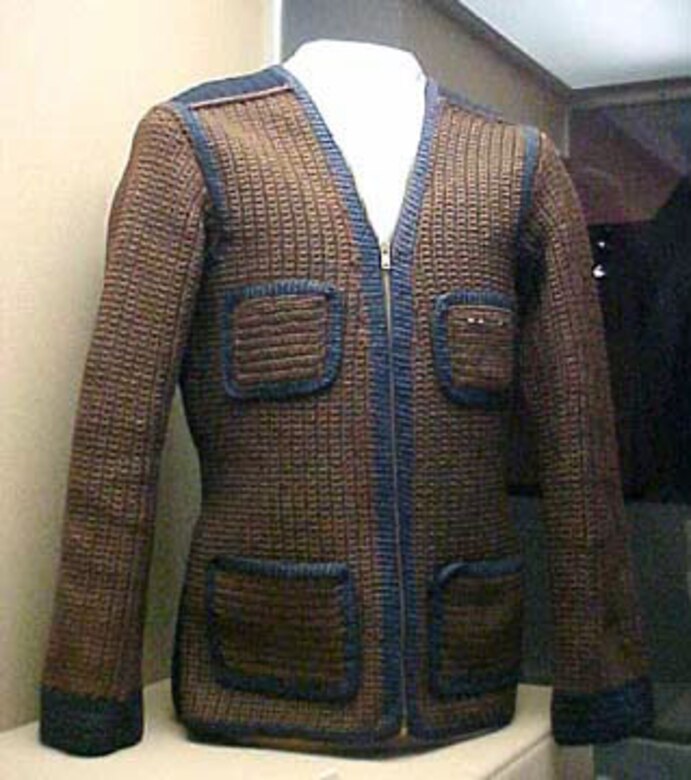 The donor of this sweater, a B-17 tail gunner, was shot down in October 1944 during a raid to Cologne. He was sent to a prisoner of war camp as the Russians advanced through Poland and East Prussia. He knitted this sweater while imprisoned at Stalag Luft I. (U.S. Air Force photo)