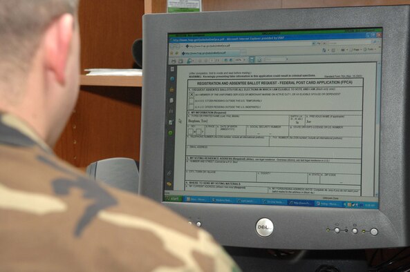 SHAW AIR FORCE BASE, S.C. -- Staff Sgt. Travis Bingham, 20th Fighter Wing, registers for an absentee ballot Dec. 20 to vote in the 2008 elections. According to Major Vincent Falls, Shaw voting assistance officer, voters should register at least 60 days prior to any election to ensure they receive their absentee ballot in time for their vote to be received and counted. (U.S. Air Force photo/Staff Sgt. Henry Hoegen)