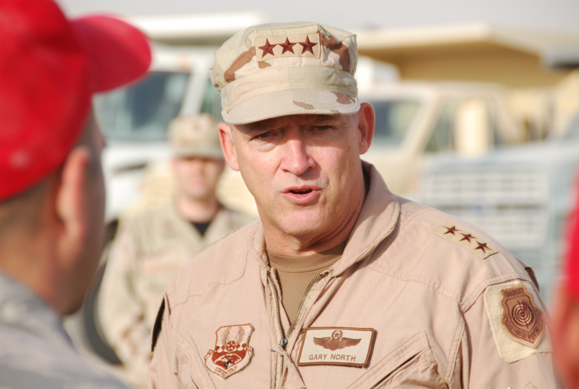 SOUTHWEST ASIA - Lt. Gen. Gary North, 9th Air Force commander,  brings Christmas greetings to Horsemen of the 1st Expeditionary RED HORSE Group during his tour at a Southwest Asia air base Dec. 23.  (U. S. Air Force photo by Staff Sgt. Douglas Olsen)