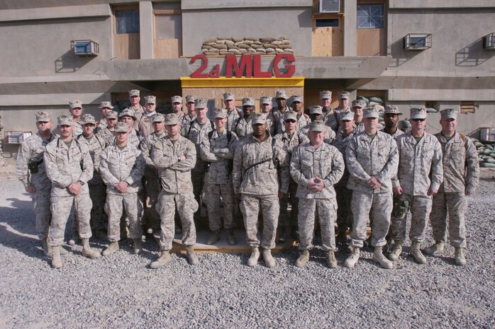 More than 30 warrant officers currently deployed to Al Taqaddum, Iraq, gathered together to socialize on Dec. 25 at the headquarters building for the 2nd Marine Logistics Group (Forward). The Marine Corps has commissioned warrant officers since 1916. Selected from the non-commissioned officer ranks, warrant officers are relied upon as the experts of their specific job fields. Those who gathered here represent approximately 620 years of combined Marine Corps experience.