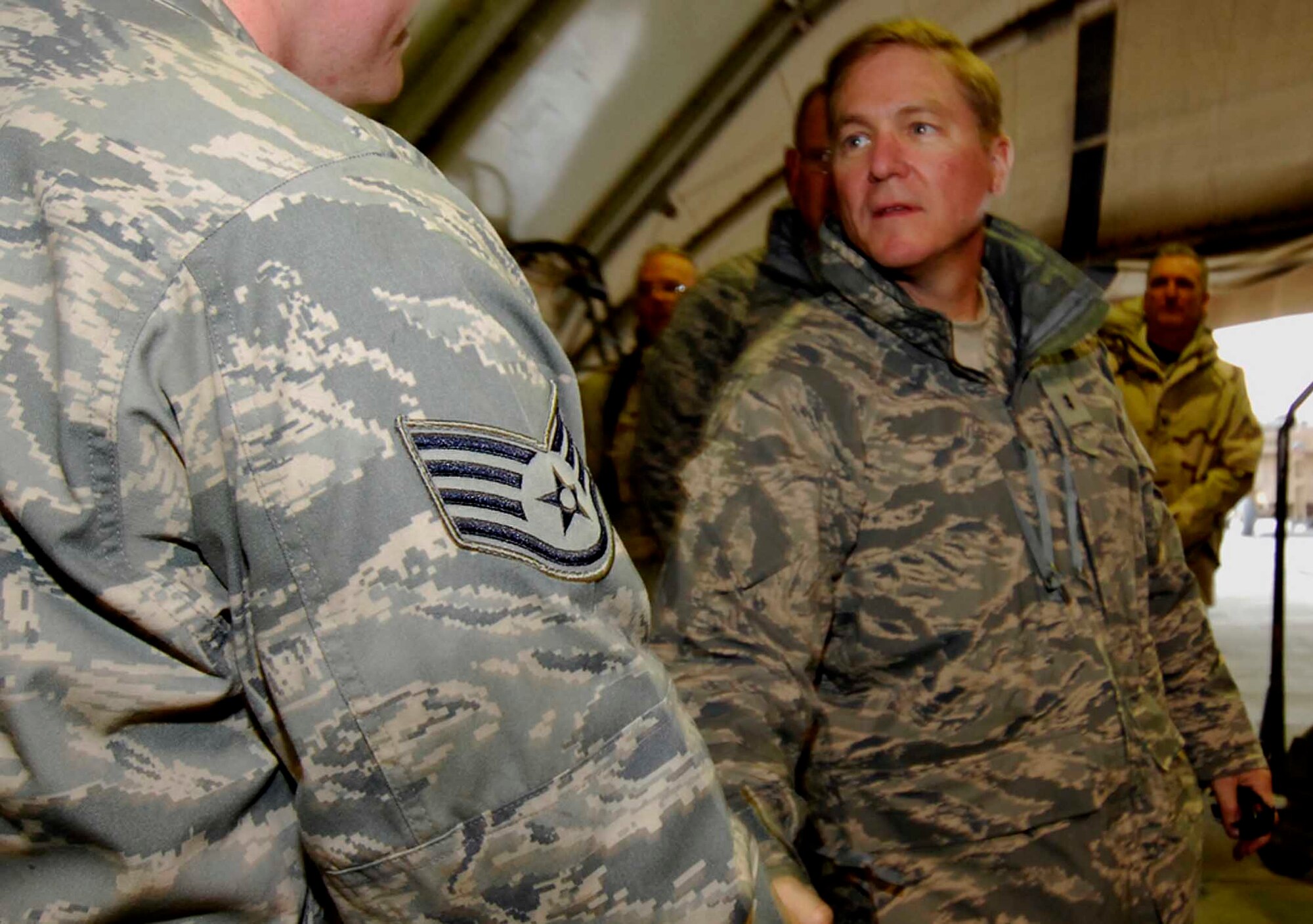 BAGRAM AIR BASE, Afghanistan - Air Force Maj. Gen. Maury Forsyth, Deputy Commander of U.S. Central Command Air Forces, shakes the hand of an Airman here Dec. 24.  General Forsyth paid visits to Airmen across the country on Dec. 24 and 25 to thank them for the service.  (U.S. Air Force Photo by Staff Sgt. Joshua Jasper)