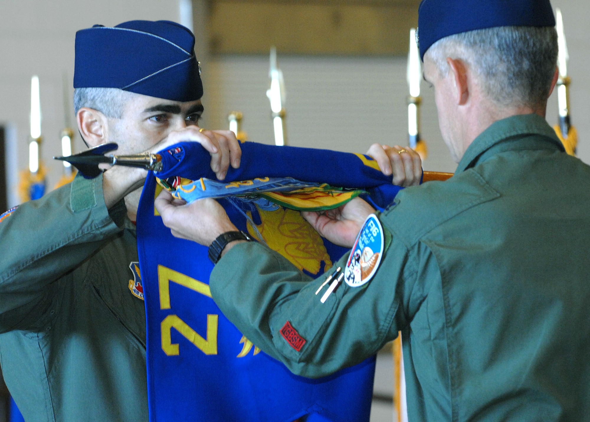 CANNON AIR FORCE BASE, N.M. -- Col. Valentino Bagnani III, 712th Operations Group (Provisional) commander, prepare the colors to be encased at the 522nd Fighter Squadron Inactivation Ceremony. The 522FS inactivated and was the final F-16 fighter squadron to do so at Cannon after a decision from the Base Realignment and Closure Commision forced the base to find a new mission. As a result, Air Force Special Operations Command took control of Cannon and their first squadron, the 73rd Special Operations Squadron, is in place now. (U.S. Air Force photo/Airman 1st Class Liliana Moreno)