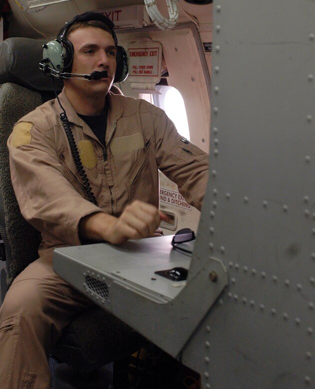 Staff Sgt. Anthony Jett runs final checks on his computer system aboard an E-8C Joint Surveillance Target Attack Radar System aircraft prior to takeoff from an air base in Southwest Asia.  JSTARS crews provide support to both air and ground forces.   Sergeant Jett is an airborne intelligence technician with the 116th Expeditionary Airborne Command and Control Squadron.  (U.S. Air Force photo/Staff Sgt. Jason Barebo)