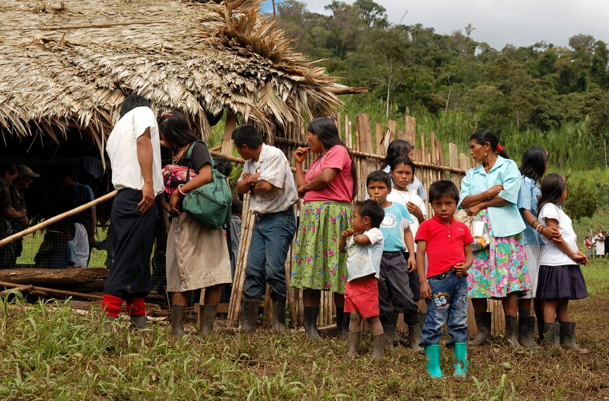 Native Costa Ricans line up outside a makeshift clinic to be seen by nurses from Joint Task Force-Bravo's medical element Dec. 18 at Piedra Mesa, Costa Rica. JTF-Bravo deployed 28 servicemembers from Soto Cano Air Base, Honduras, to Costa Rica at the invitation of the country's ministry of health for a medical readiness training exercise. (U.S. Air Force photo/Staff Sgt. Austin M. May) 