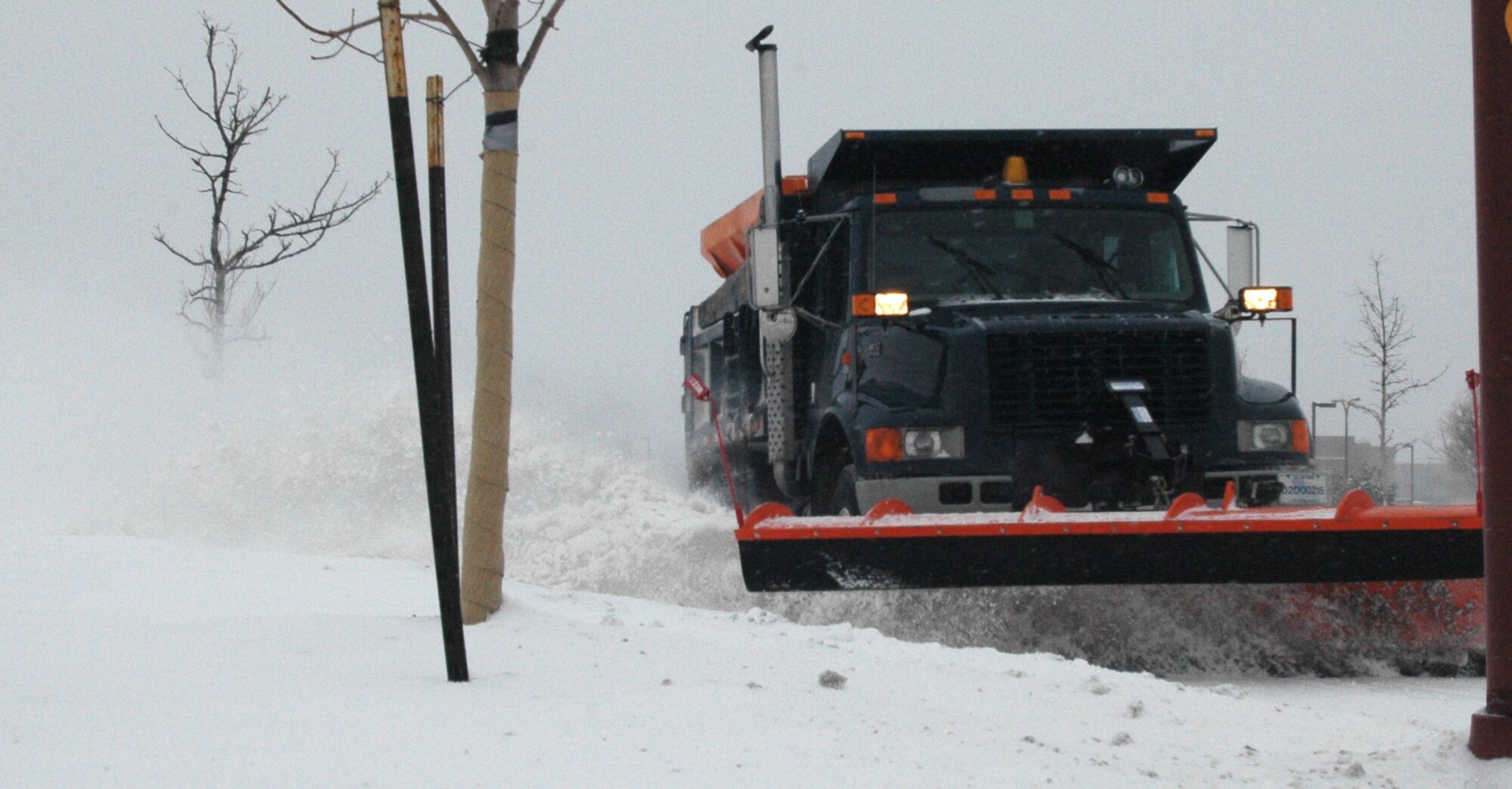 The 460th Civil Engineer Squadron mobilized 10 snowplows to clear 35 miles of roads on Buckley Air Force Base during a snowstorm Dec. 27. (U.S. Air Force photo by Capt. Adrianne Michele)