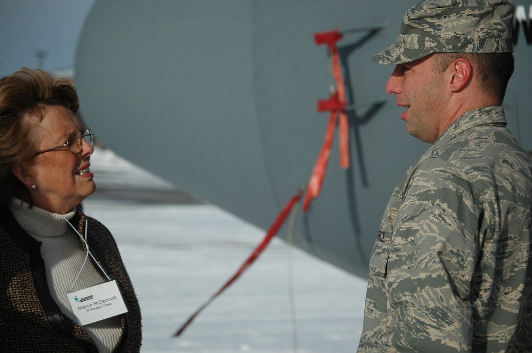 Lt. Col. Michael Burns, 302nd Mission Support Group commander, discusses the Air Force Reserve lifestyle with Ms. Sharon McDermott at Peterson Air Force Base, Colo. Dec. 13, 2007. Ms. McDermott was part of a the Leadersip Pikes Peak group that toured base facilities and work centers to build awareness of the various Air Force missions based in Colorado.