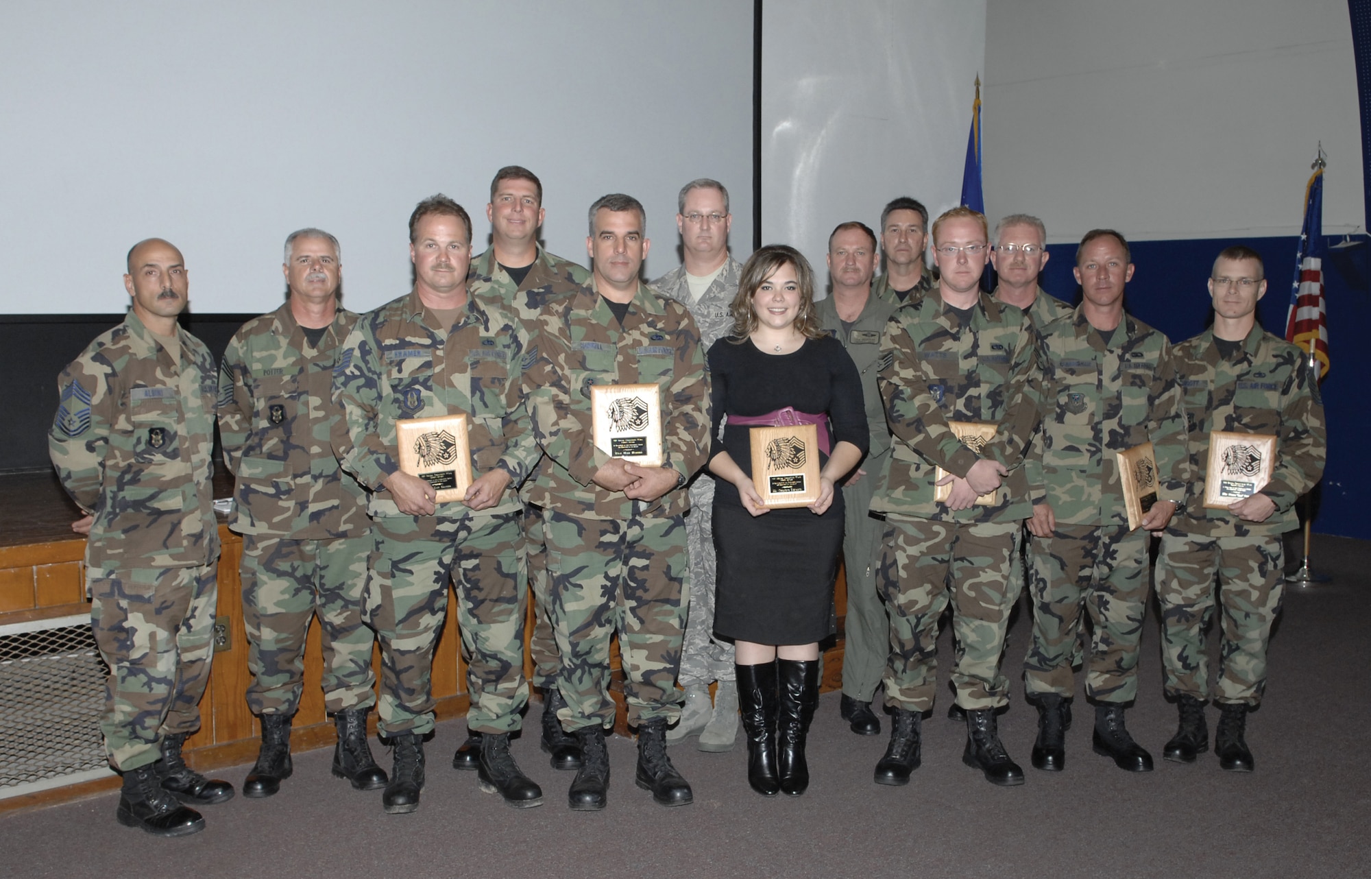 Additional Chief's Award recipients were (front row, left to right) Tech. Sgts. Dan Kramer and Mark Harrell, Christine DeNamur, Staff Sgts. Ty Watts and Billy D. Cunningham, and Master Sgt. William Piggot. The chief master sergeants who funded the awards were (back row, left to right) Chief Master Sgts. Paul Albini, Kenneth Potter, Alex Hughes, Jeffrey Fitzpatrick, Lyle Spangler, Senior Master Sgt. Larry Rosamond, in place of Telford Burtts, and Chief Master Sgt. Joseph Haveard. Sponsors and recipients not pictured are Chief Master Sgts. Philip Bahm, Dale Berryhill, Christopher Goosby, William Posey, Glen Sconiers, and David Simmet; and Senior Master Sgt. Kevin Quimette; Master Sgts. Darren Cogan, Anthony Kolarick; and Walisa Villarreal; Senior Airman Jennifer Lefton; and Bill Meredith. (U.S. Air Force Photo/Mike Fleck)