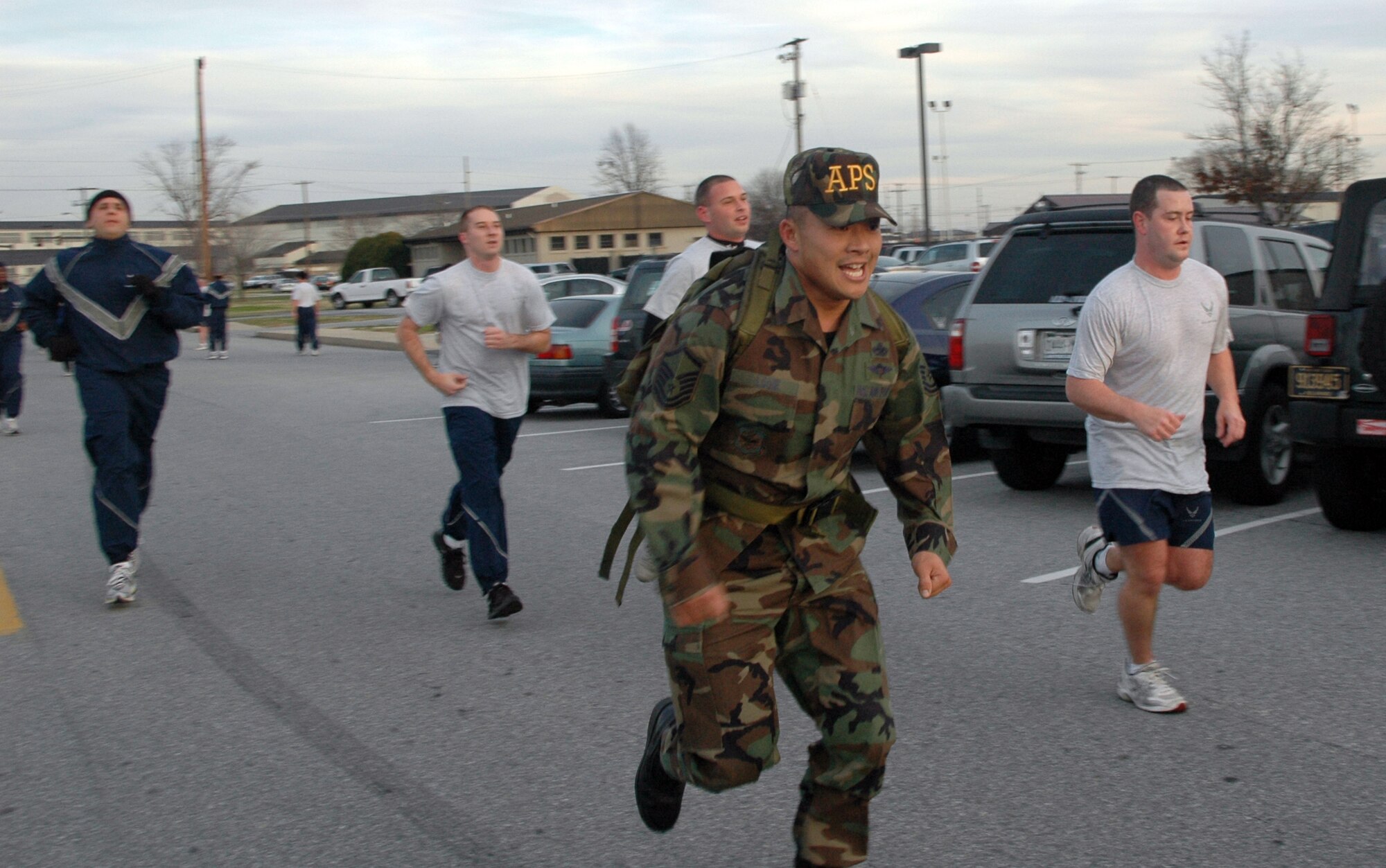 Master Sgt. Sam Louie, 436th Aerial Port Squadron, crosses the finish line carrying over a 30-plus pound rucksack. The master sergeant has competed in ruck run’s across the nation, including competing on a four-member Dover team on a 6.2 mile run sponsored by Gold Star Mother’s club, and organization that provides support for mothers who lost sons or daughters in war. (U.S. Air Force photo/Senior Airman Sasha Horne)
