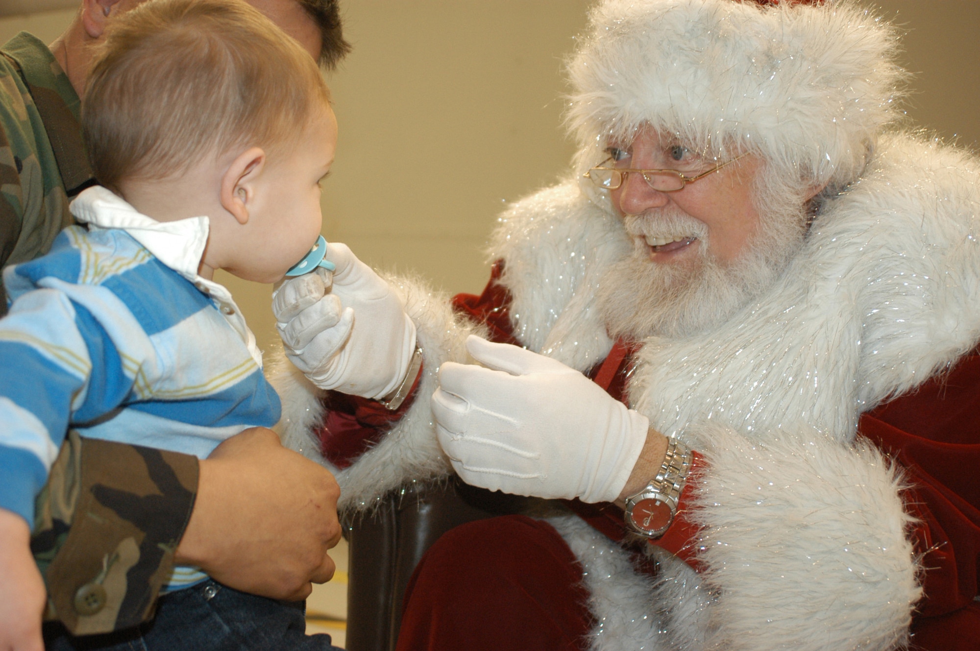 Santa has visited hundreds of Air Force Reserve children, young and old, at the Naval Air Station Joint Reserve Base Fort Worth's 301st Fighter Wing for nearly half a dozen years. (U.S. Air Force Photo/Tech. Sgt. Julie Briden-Garcia)