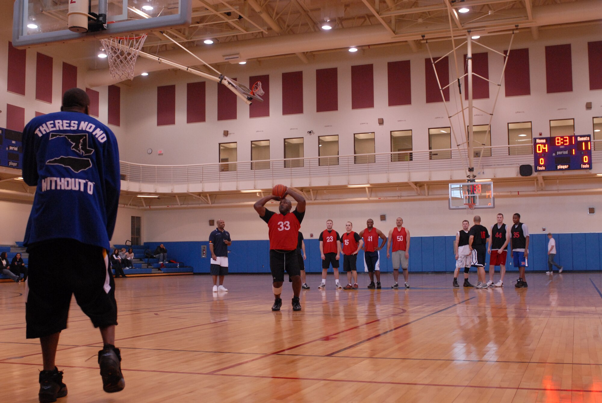 KUNSAN AIR BASE, South Korea -- Captain Fontez Wilkerson, 8th Mission Support Squadron, shoots a free-throw after technical foul call during the Kunsan Celebrity Basketball Tournament here Dec. 29.  The tournament consisted of six teams, Commanders and Chiefs, Company Grade Officers, First Sergeants, Top-Three, Team 5/6 and Airmen Committed to Excellence. The tournament is an event held to help raise funds for the men’s and women’s varsity basketball teams, boost morale, and encourage friendly sport competition during the holiday season. (U.S. Air Force photo/Senior Airman Giang Nguyen)