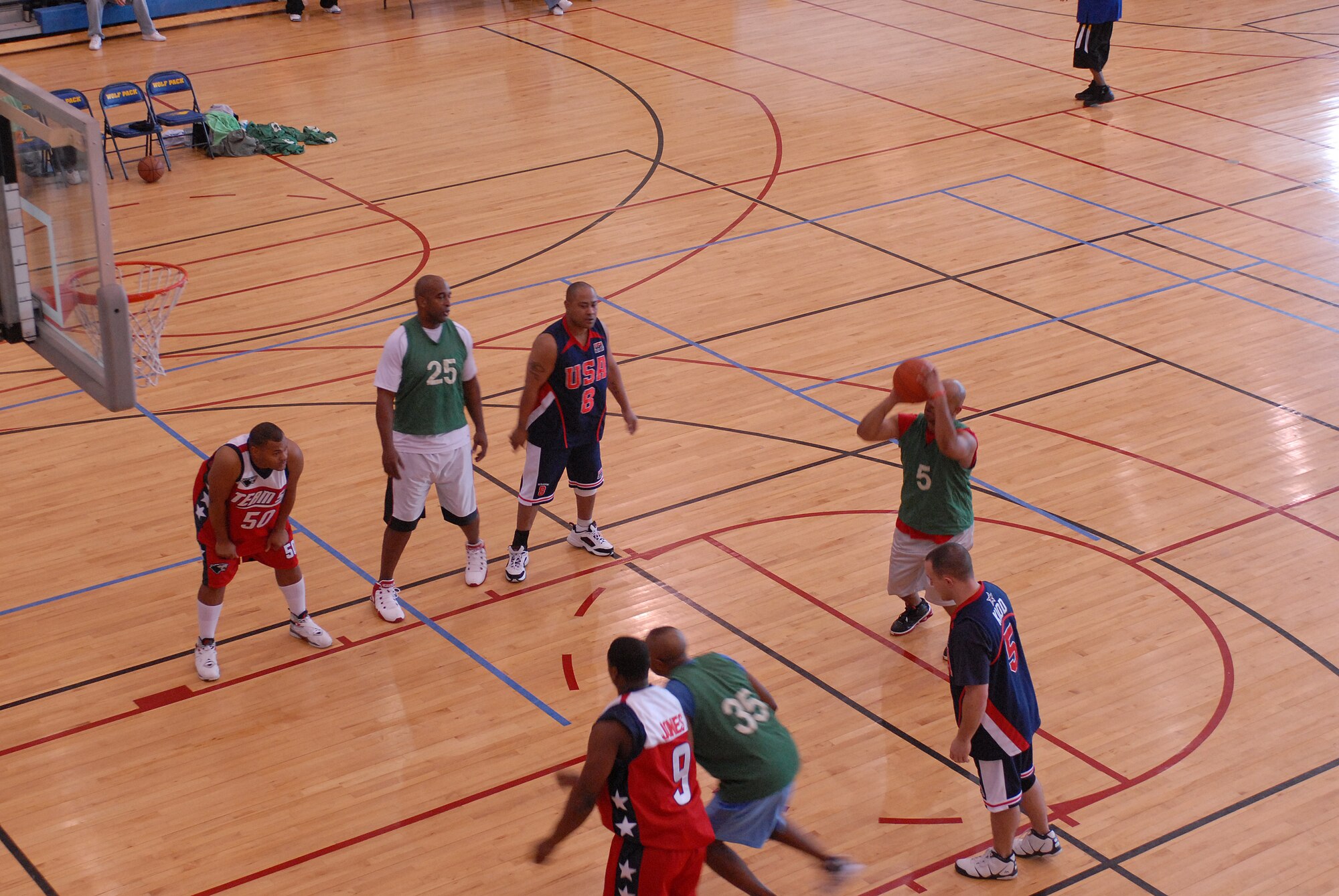 KUNSAN AIR BASE, South Korea -- Master Sgt. Anthony Harris from the 8th Logistical Readiness Squadron attempts a free-throw during the Kunsan Celebrity Basketball Tournament here Dec. 29. The tournament is an event held to help raise funds for the men’s and women’s varsity basketball teams, boost morale, and encourage friendly sports competition during the holiday season. (U.S. Air Force photo/Senior Airman Giang Nguyen)