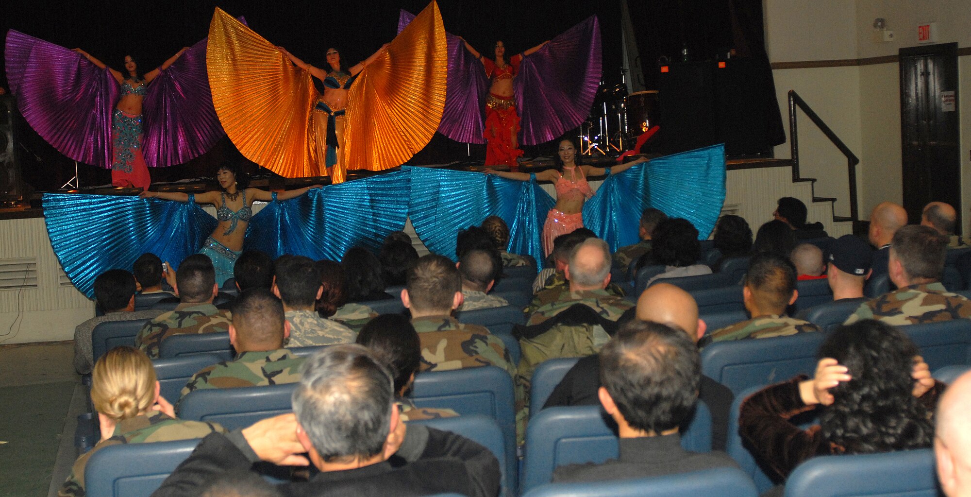 KUNSAN AIR BASE, South Korea -- Belly dancers from Jeonju City performs for Airmen here Dec. 28.  The group performed as part of Kunsan’s Good Neighbor Program and gave Airmen a chance to learn about Korean music and culture.  (U.S. Air Force photo/Senior Airman Giang Nguyen)