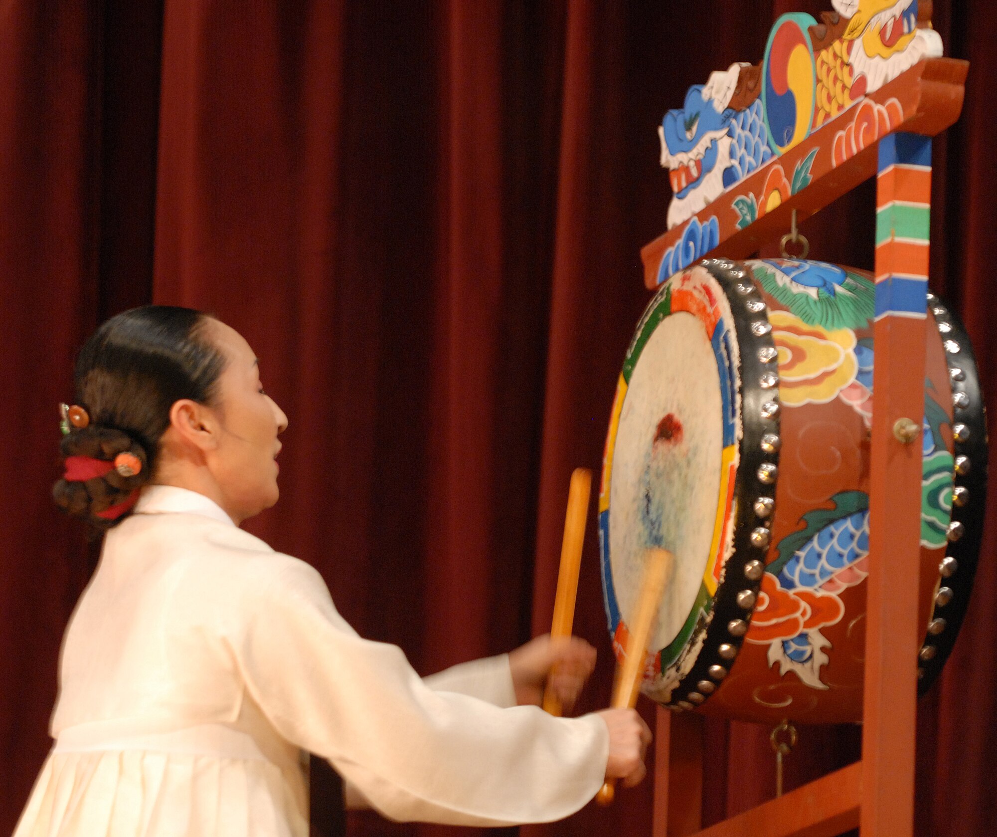 KUNSAN AIR BASE, South Korea -- Ms. Yong Ja, Cho from Gunsan City performs for Airmen here Dec. 28.  The group performed as part of Kunsan’s Good Neighbor Program and gave Airmen a chance to learn about Korean music and culture.  (U.S. Air Force photo/Senior Airman Giang Nguyen)