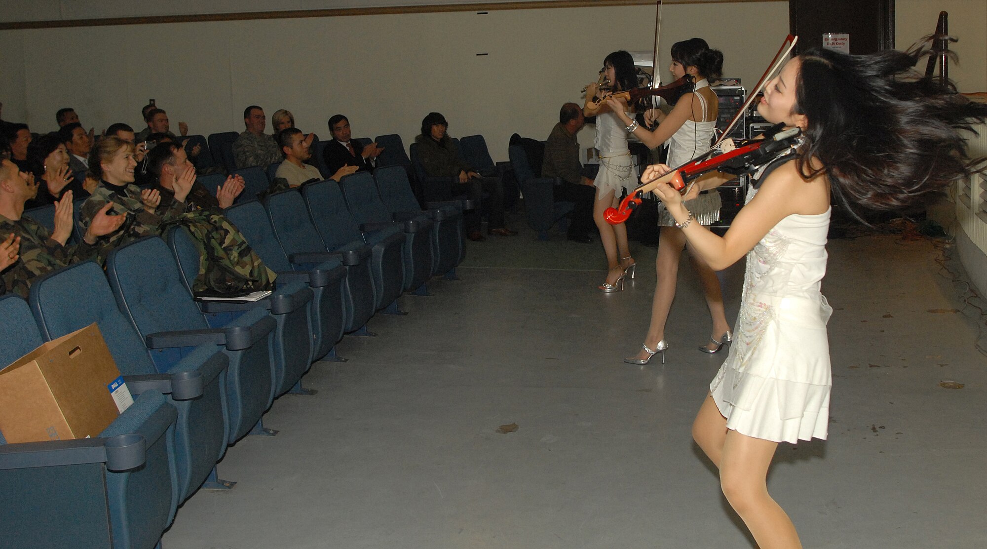 KUNSAN AIR BASE, South Korea -- The Jung Ah performance group from Busan City performs for Airmen here Dec. 28.  The group performed as part of Kunsan’s Good Neighbor Program and gave Airmen a chance to learn about Korean music and culture.  (U.S. Air Force photo/Senior Airman Giang Nguyen)