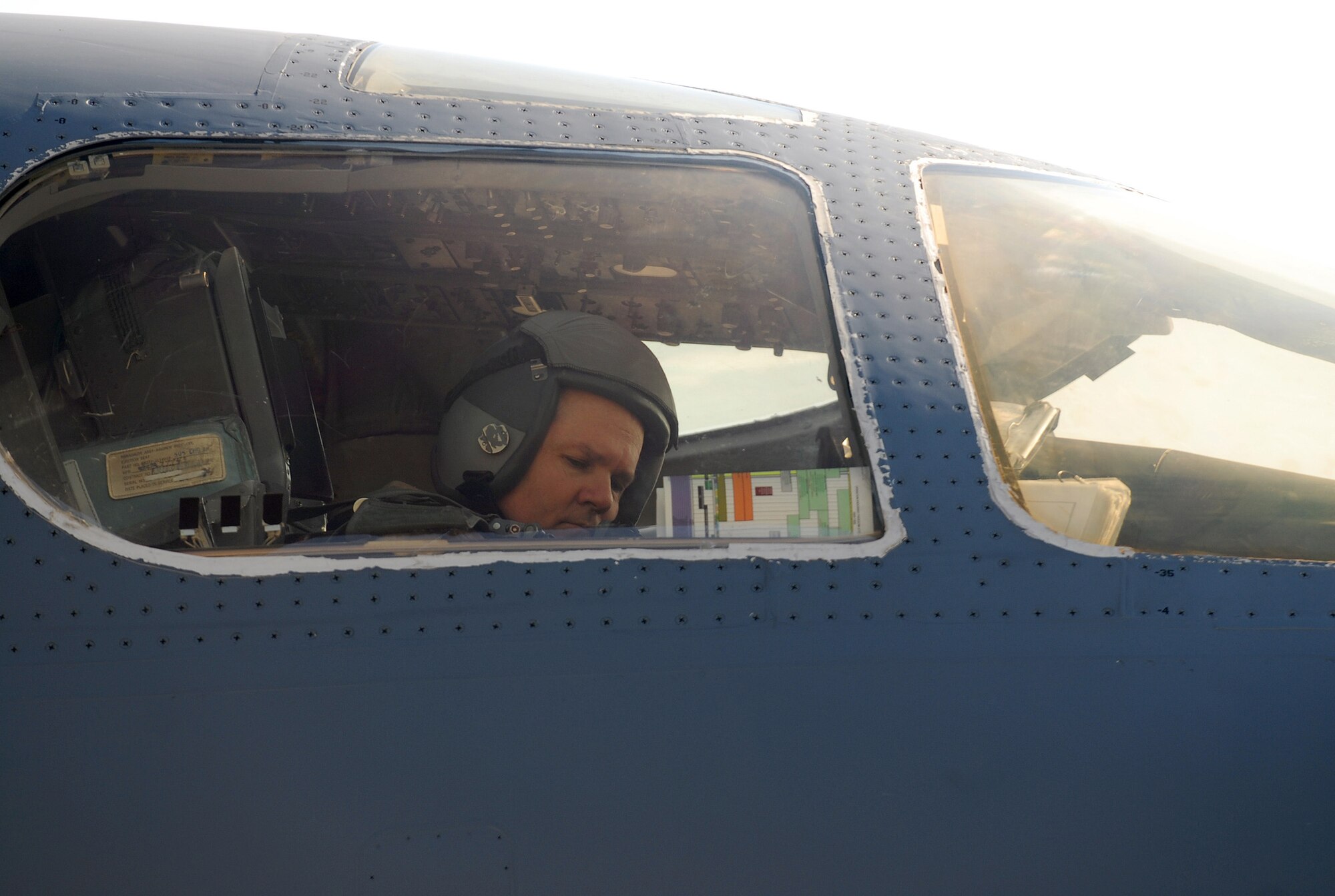SOUTHWEST ASIA - Brig. Gen. Charlie Lyon, 379th Air Expeditionary Wing commander, settles into the copilot's seat of the B-1B Lancer bomber he will fly on a mission at a Southwest Asia air base Dec. 29. (U. S. Air Force photo/Staff Sgt. Douglas Olsen)