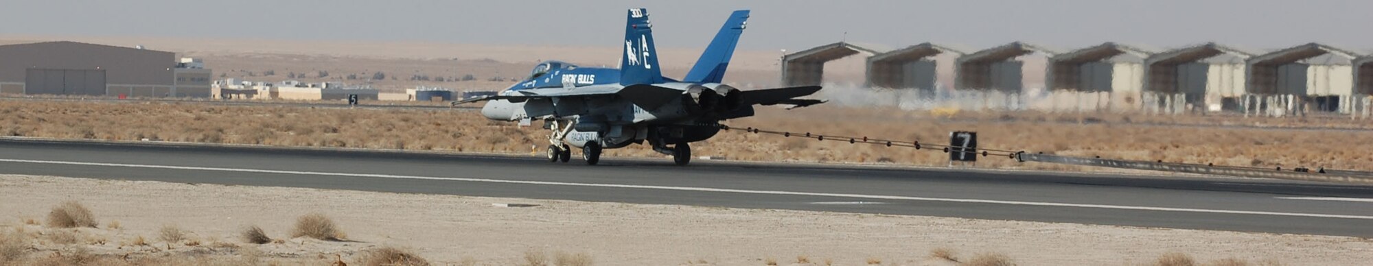 SOUTHWEST ASIA – An FA-18 from the USS John C. Stennis engages the barrier during a certification run Dec. 27 at an air base in the Middle East. (Air Force photo\Staff Sgt. Phillip Butterfield)
